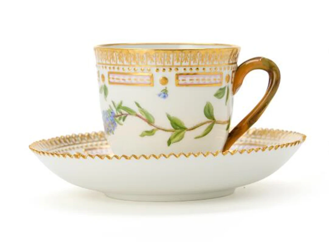 "Flora Danica" enamelled and gilt porcelain coffee cup and saucer.