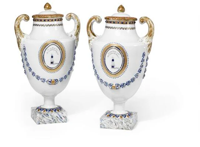 A pair of Chinese urn-shaped export porcelain vases on foursided bases.