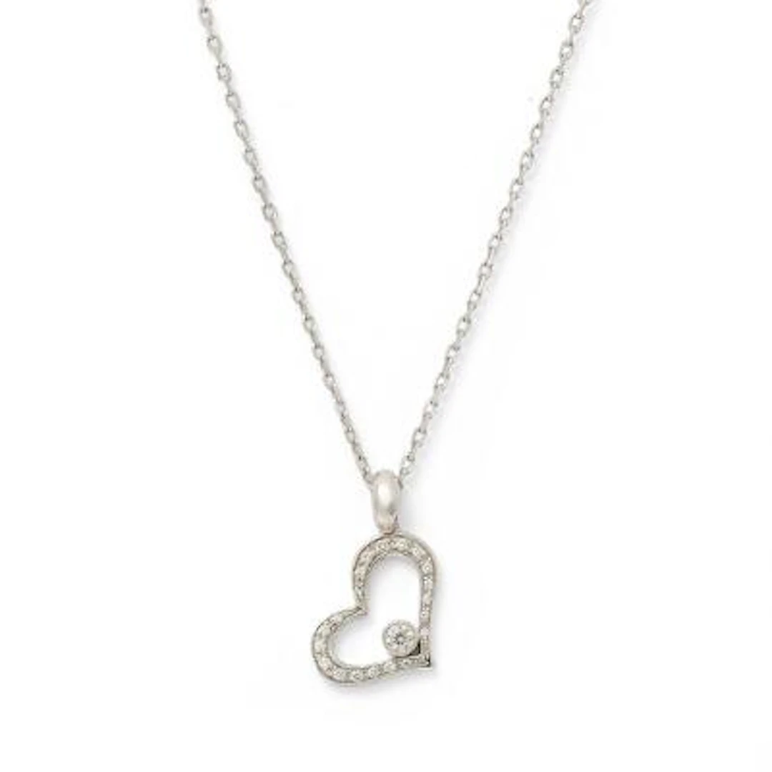 Piaget: A "Limelight" heart-shaped diamond pendant, mounted in 18k