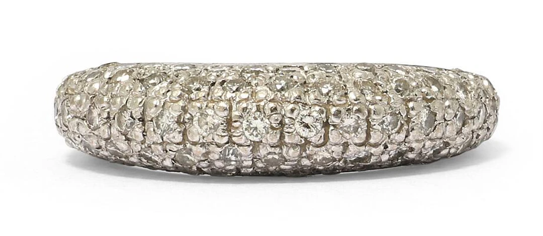 A diamond ring set with numerous diamonds weighing a total of app.