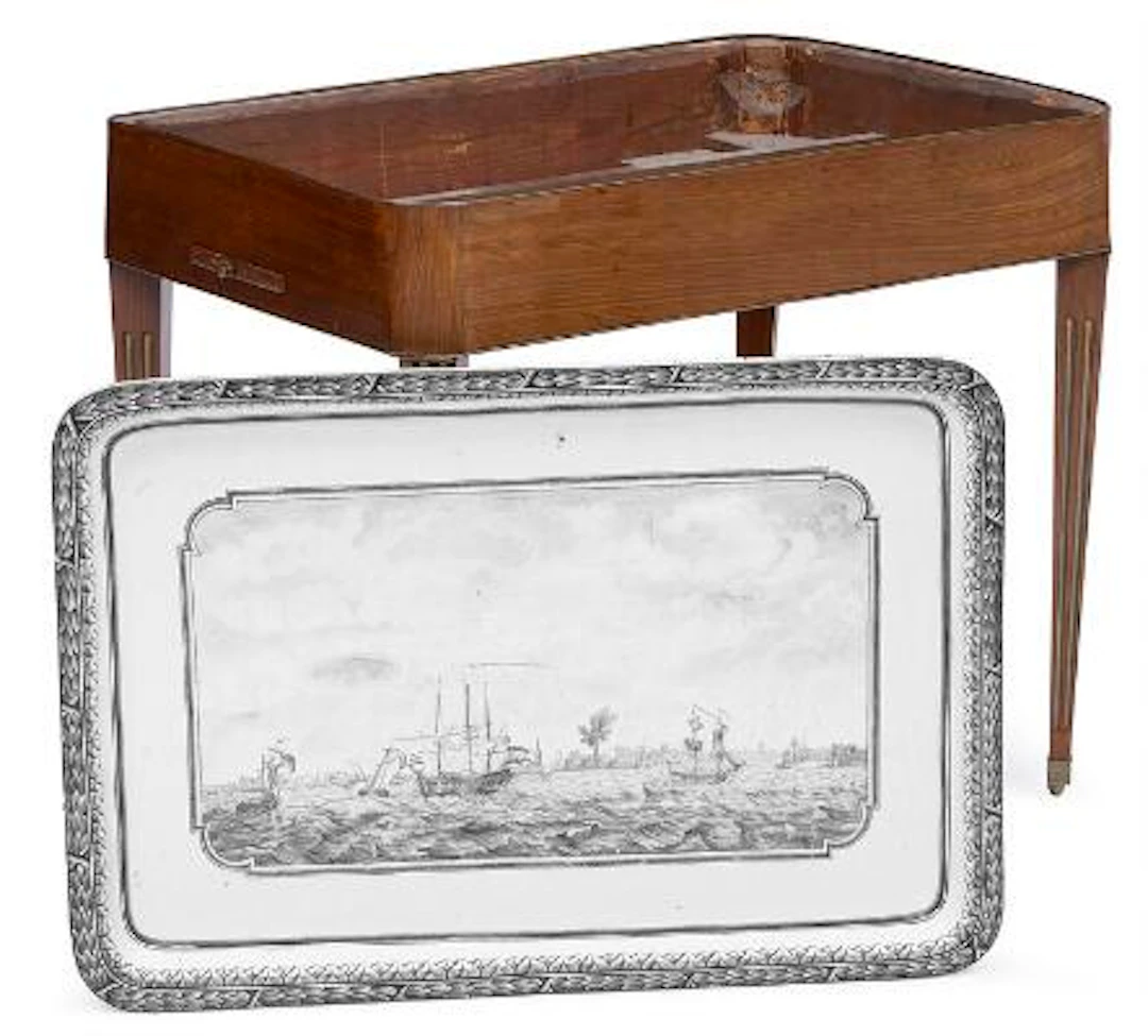 A Gustavian faience tray table. Sweden, late 18th century. H. 76 cm.