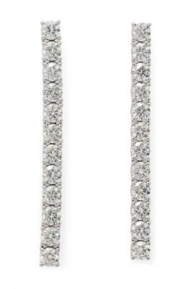 A pair of diamond ear pendants set with diamonds weighing a total