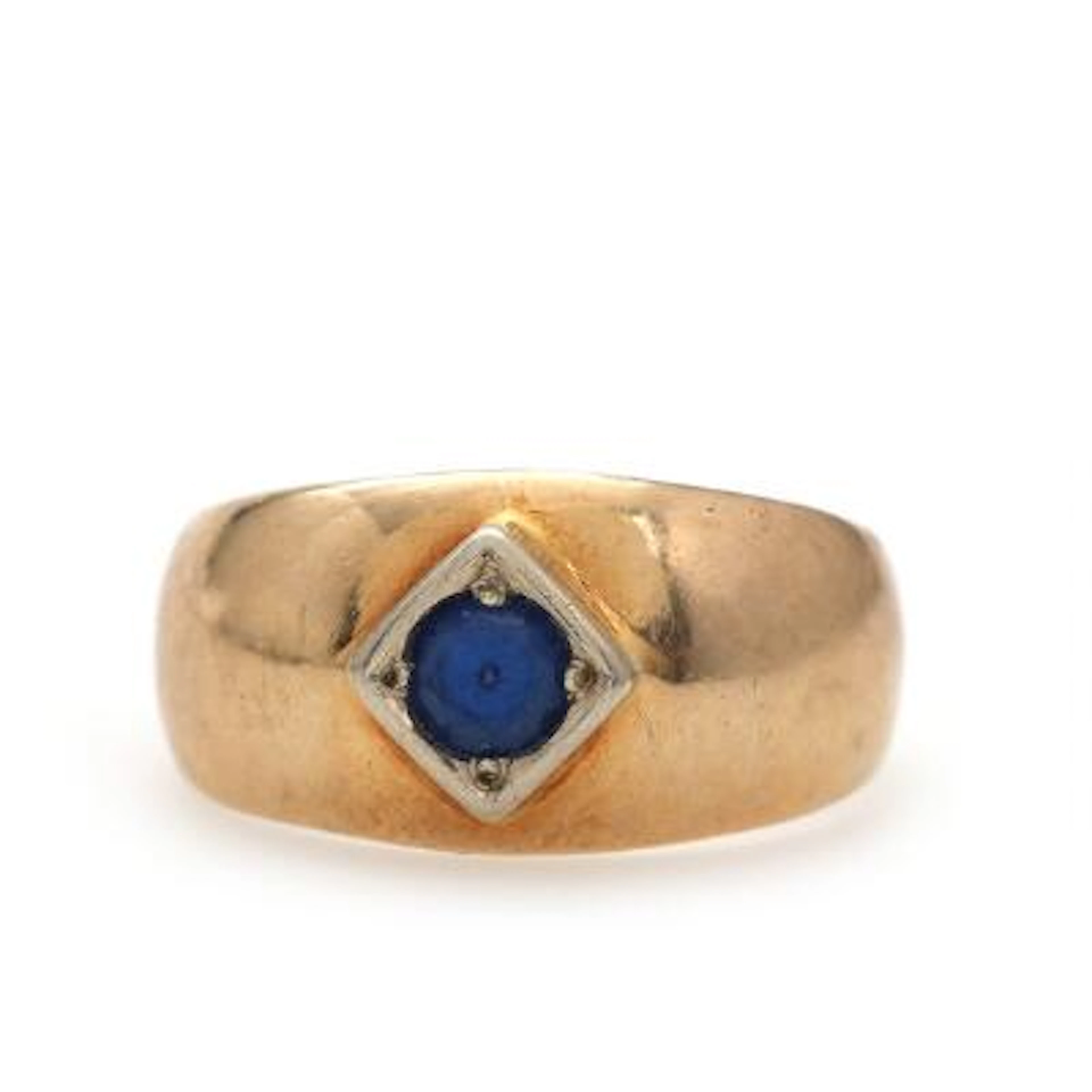 A sapphire ring set with syntetic sapphire, mounted in 14k gold. Size