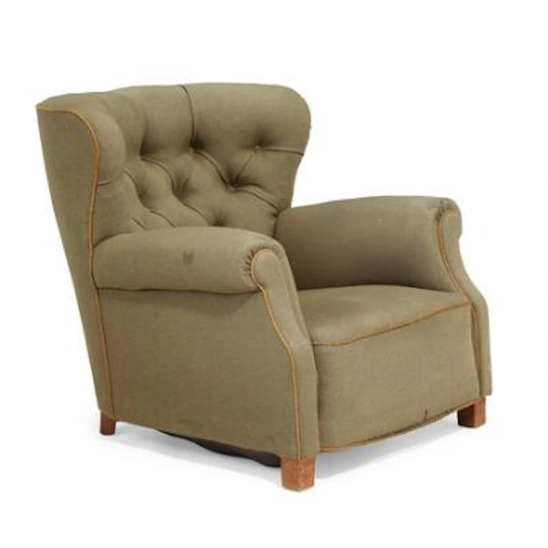 Fritz Hansen: Easy chair with stained beech legs. Seat, sides and