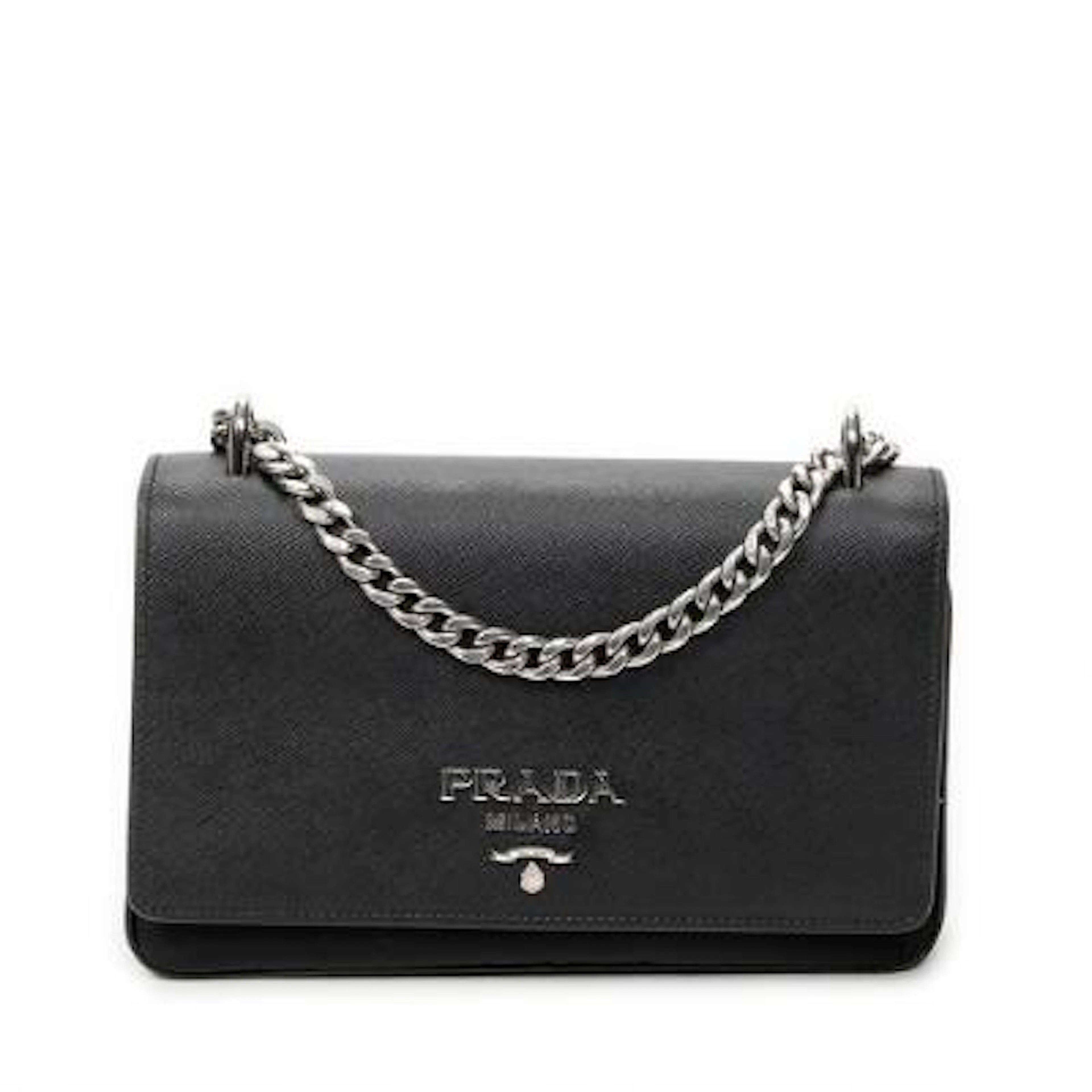 Prada: A "Chain Flap Crossbody" bag in partly black canvas and nylon