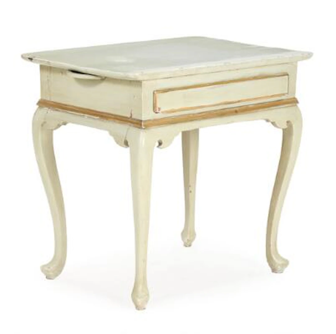 A 18th century paited and gilded Rococo table, front with drawer