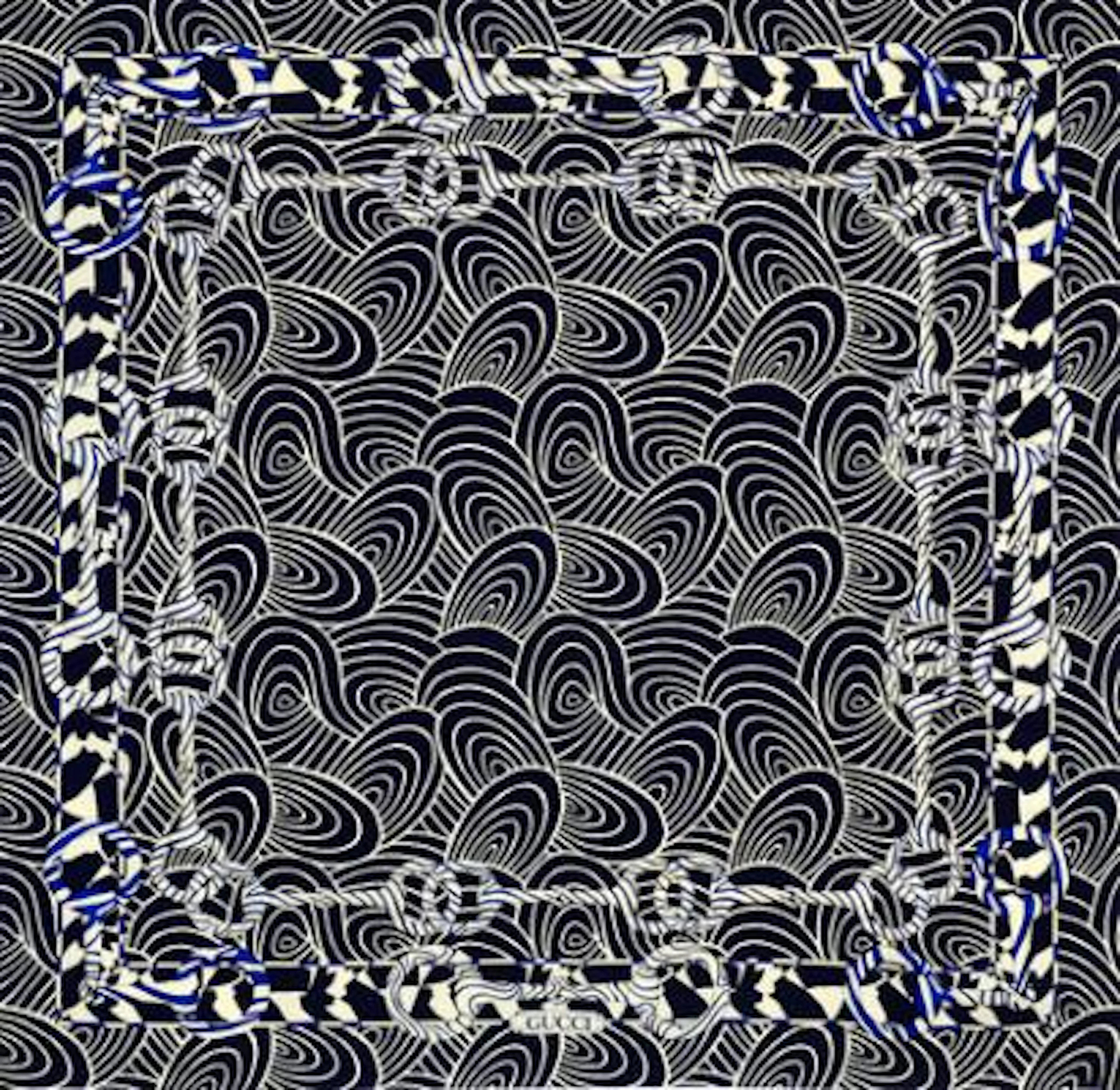 Gucci: A silk scarf with white and dark blue motif. App. 85 x 85 cm.