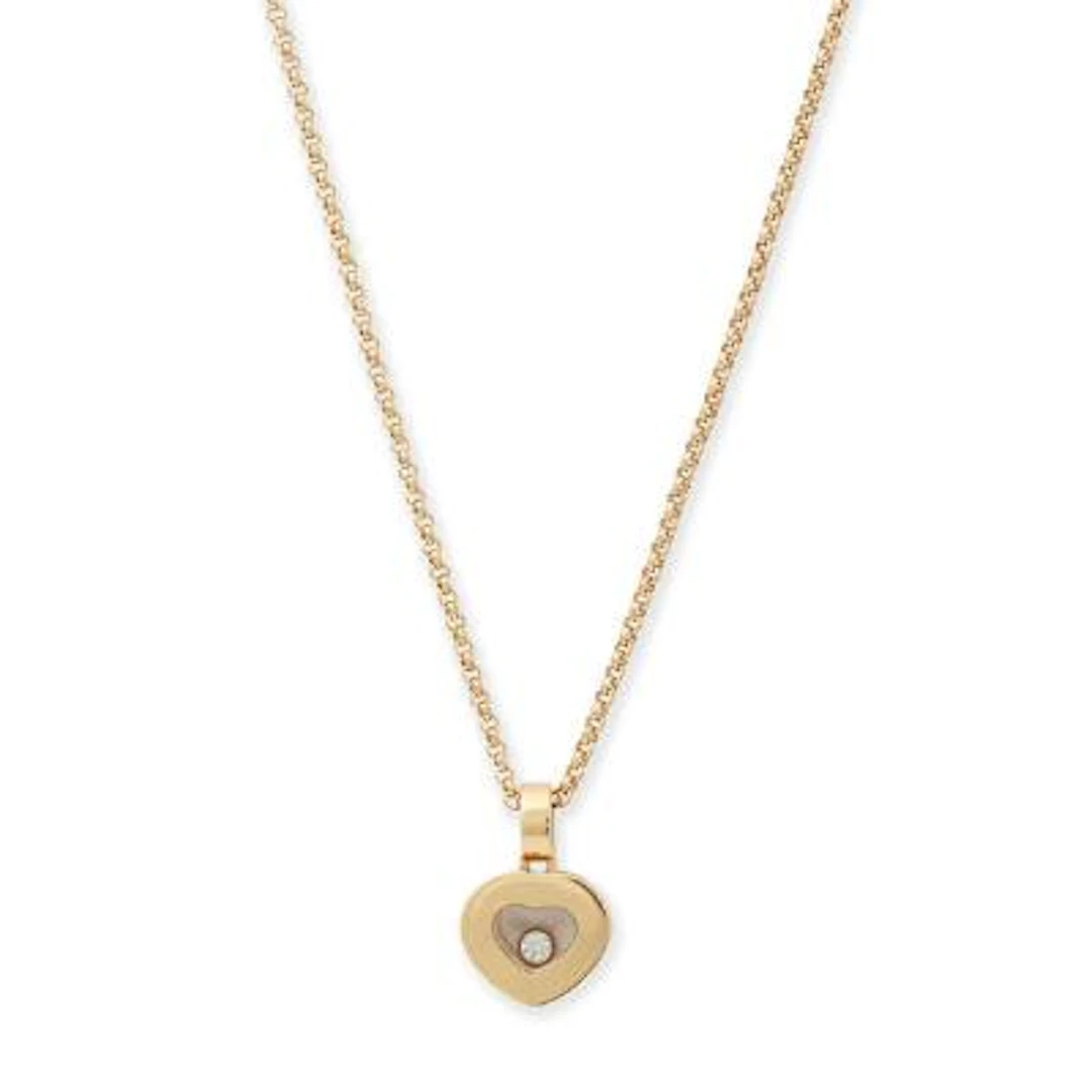 Chopard: A "Happy Diamonds Icon" diamond pendant, mounted in 18k gold.