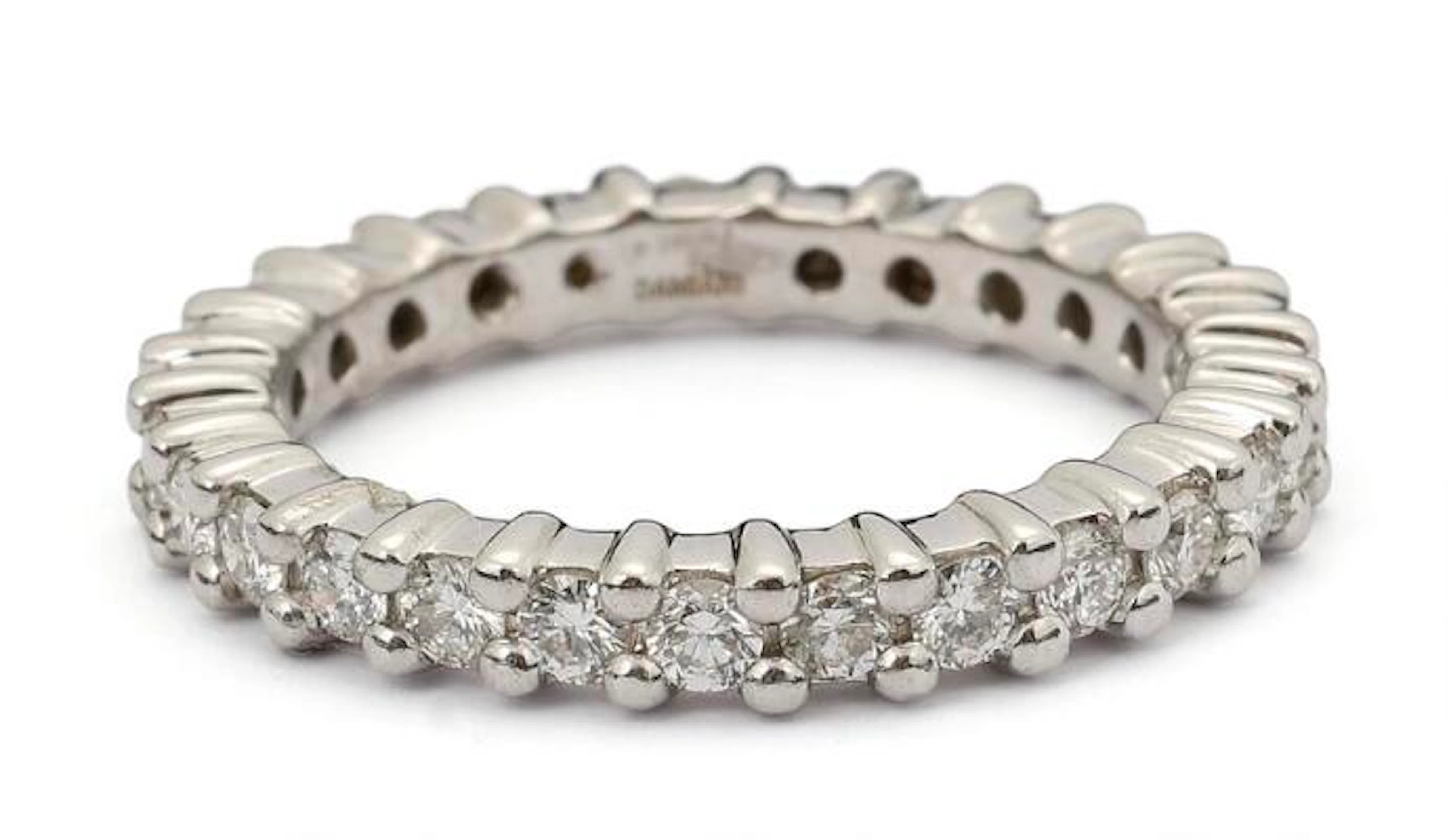 Damiani: An eternity diamond ring set with numerous brilliant-cut