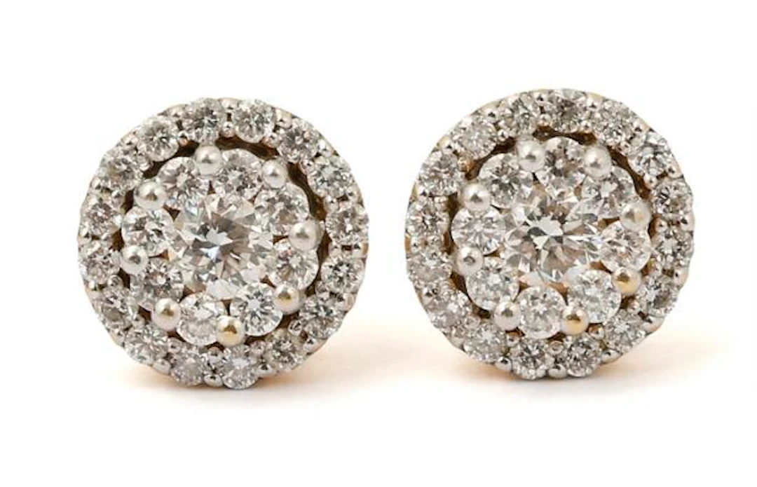 A pair of diamond ear studs each set with diamonds, mounted in 18k