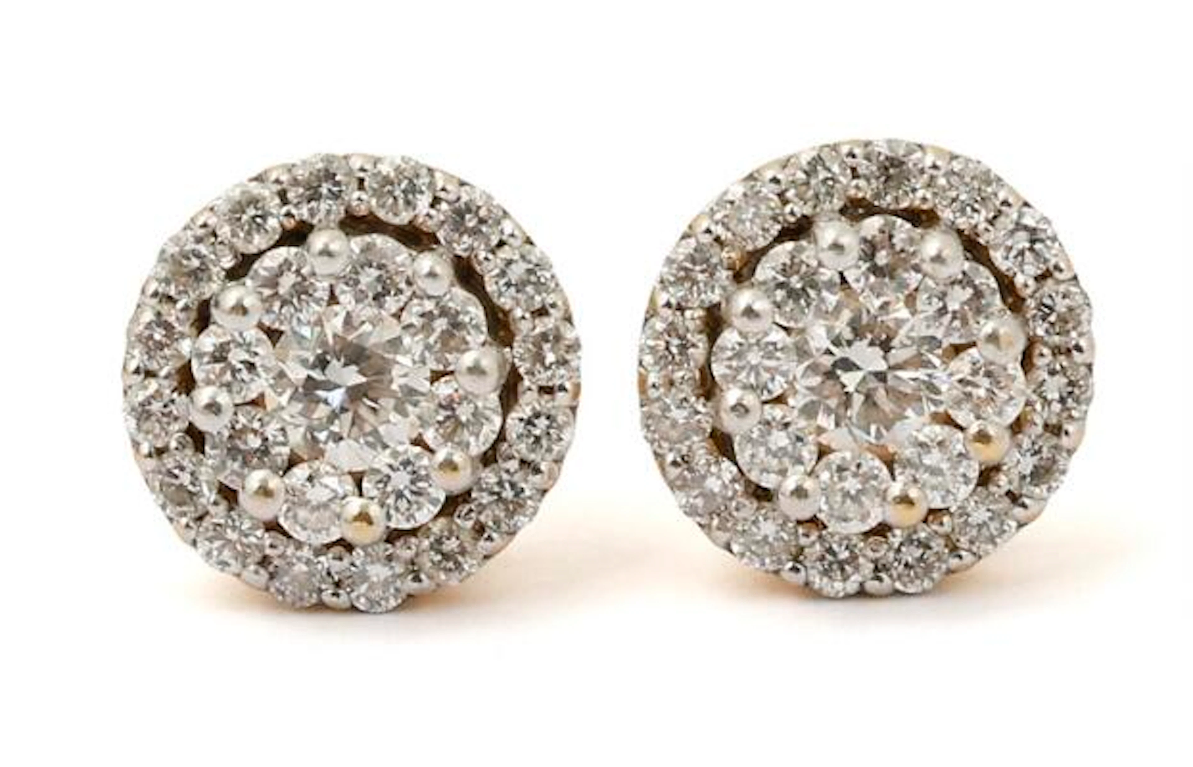 A pair of diamond ear studs each set with diamonds, mounted in 18k