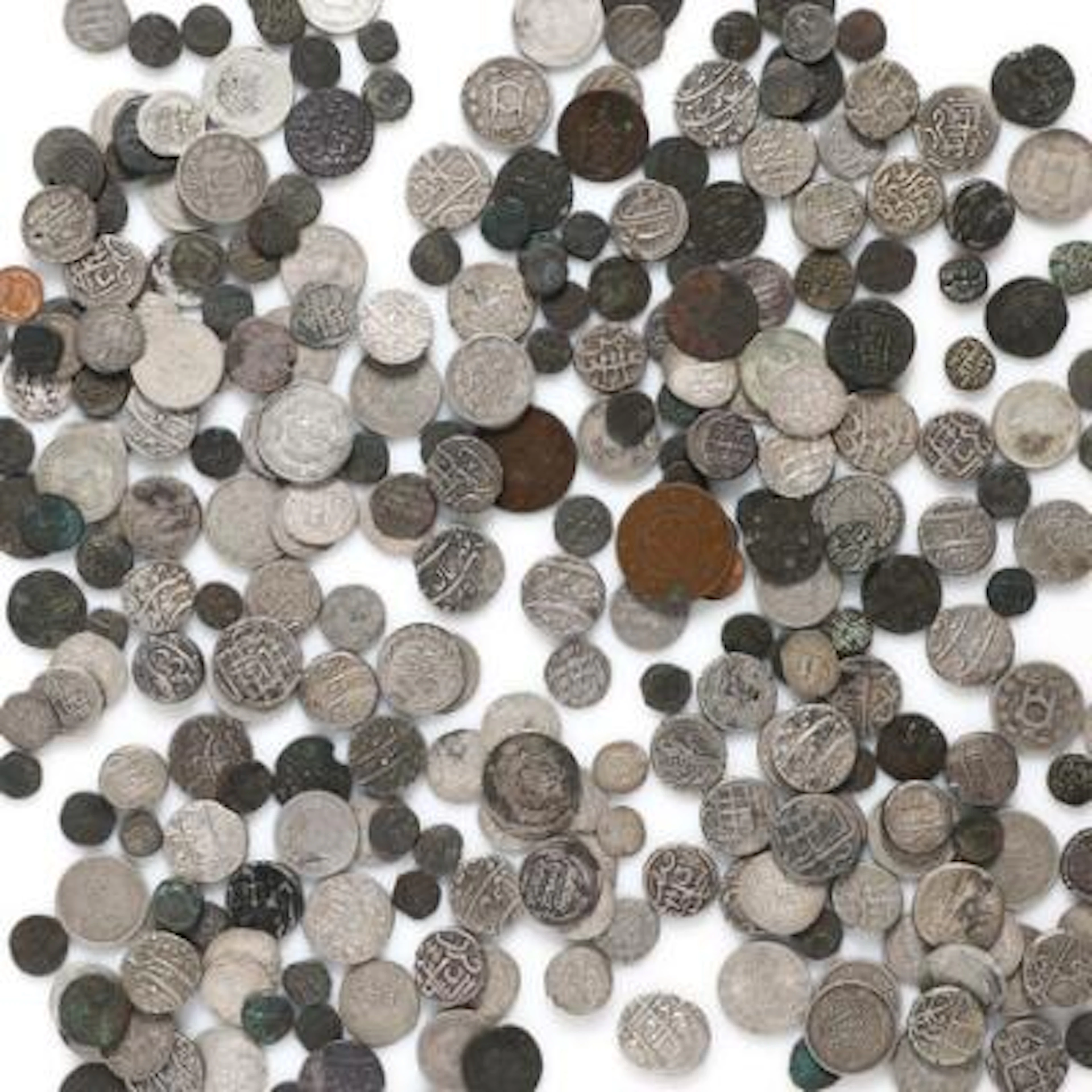 Box with collection of coins from Afghanistan, India and Pakistan