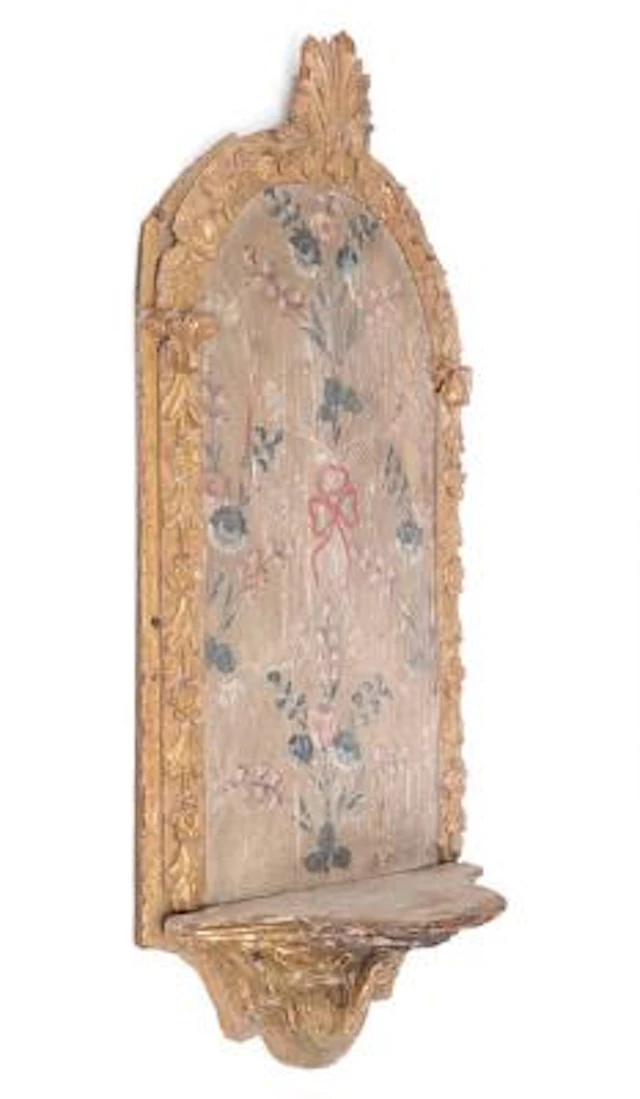 An Italian wall console of gilded wood. 18th century. H. 111 cm W.