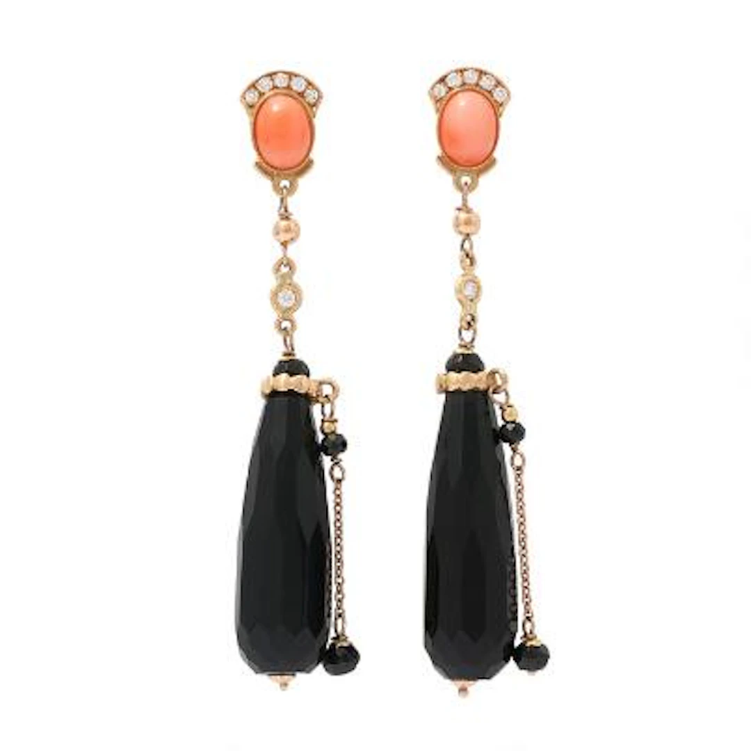 A pair of earpendants each set with an onyx, a coral and numerous