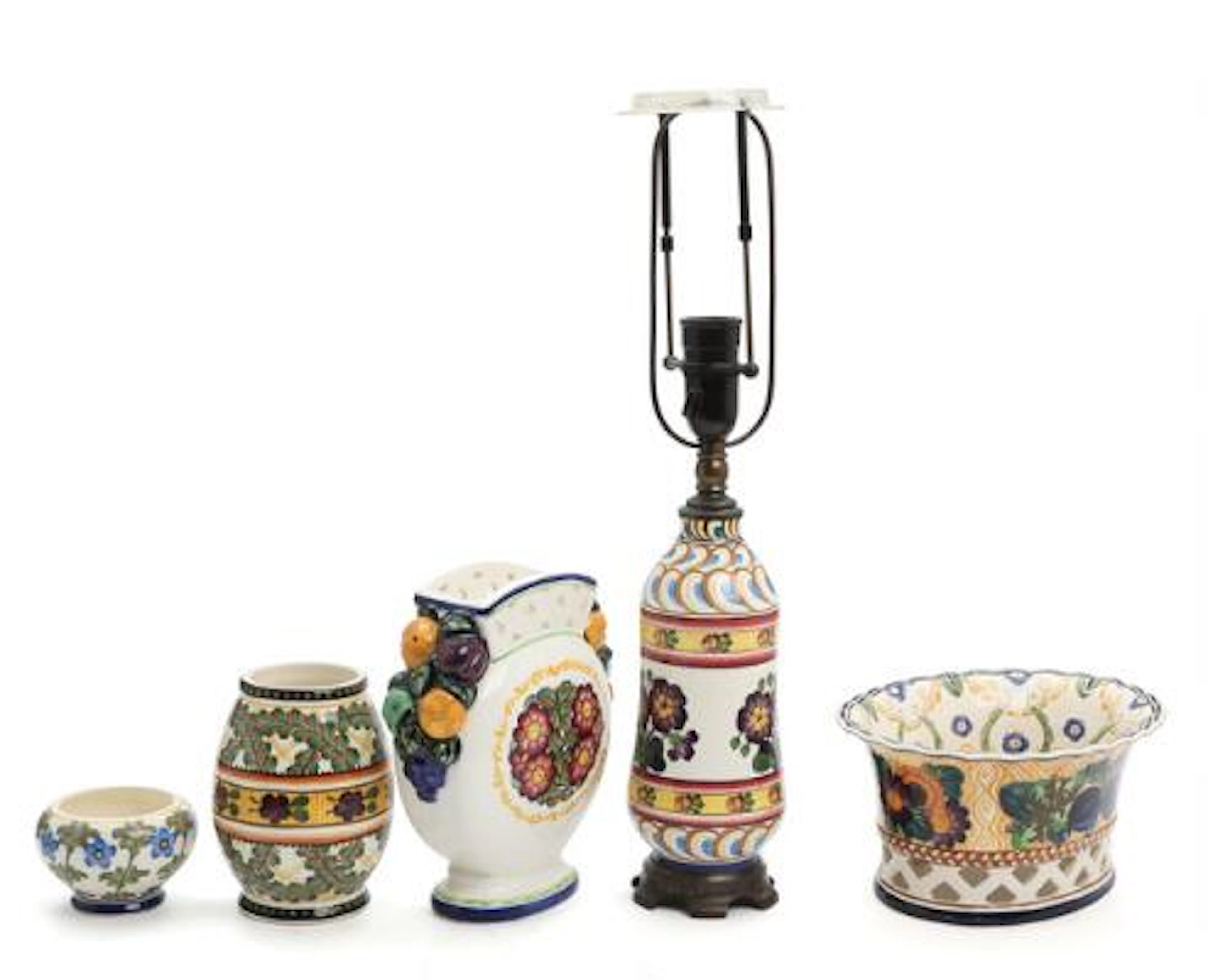 A selection of Aluminia faience, decorated in colours with flowers