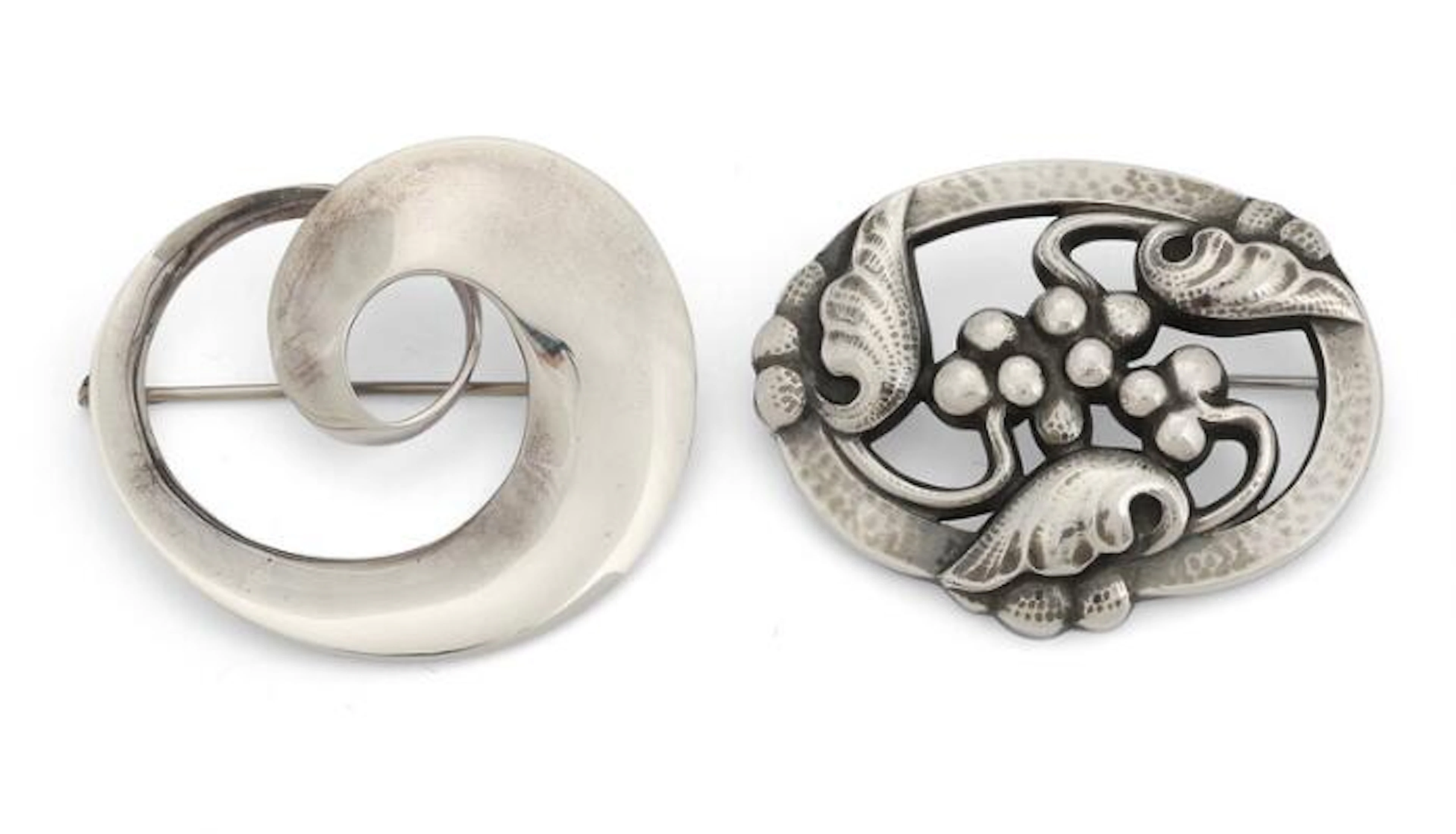 Georg Jensen: Two brooches of sterling silv. Dessin 101 and 445. Weight