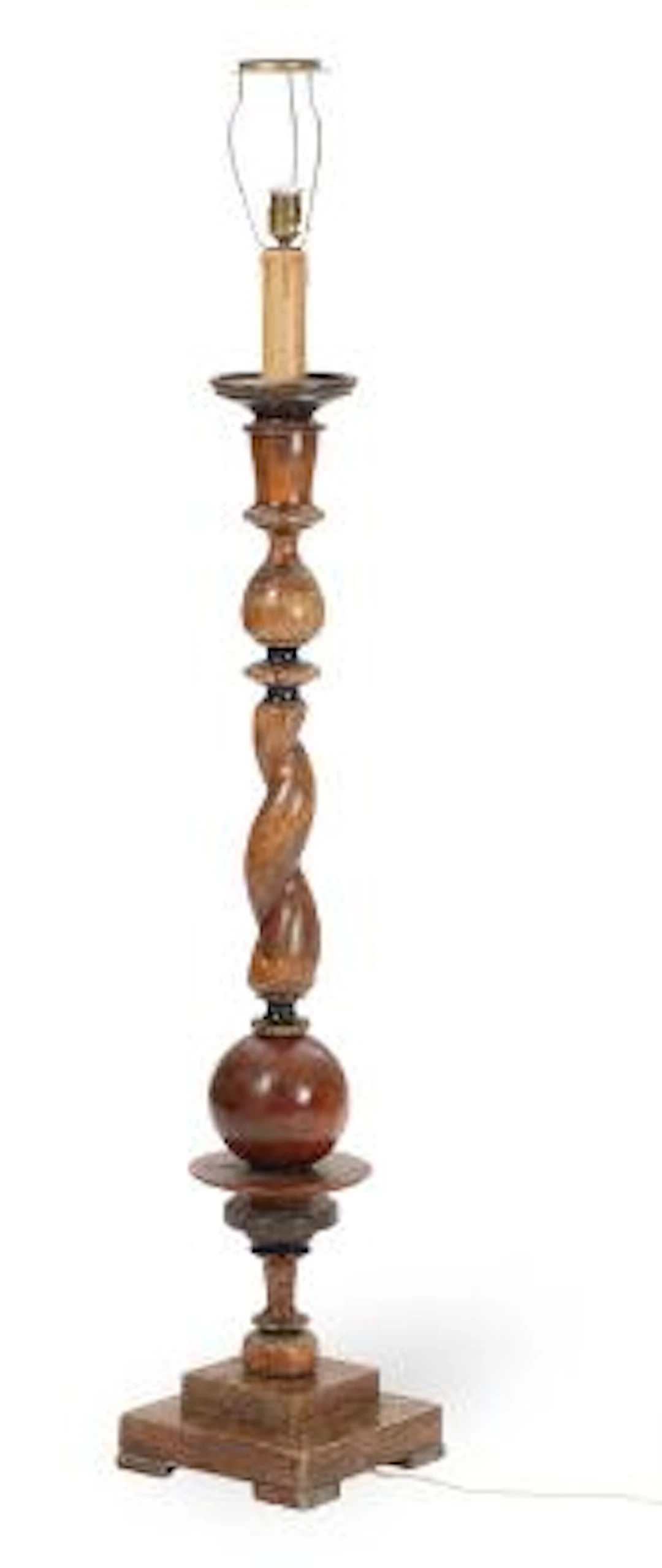 Floor lamp of carved and partly black-stained wood, twisted stem with