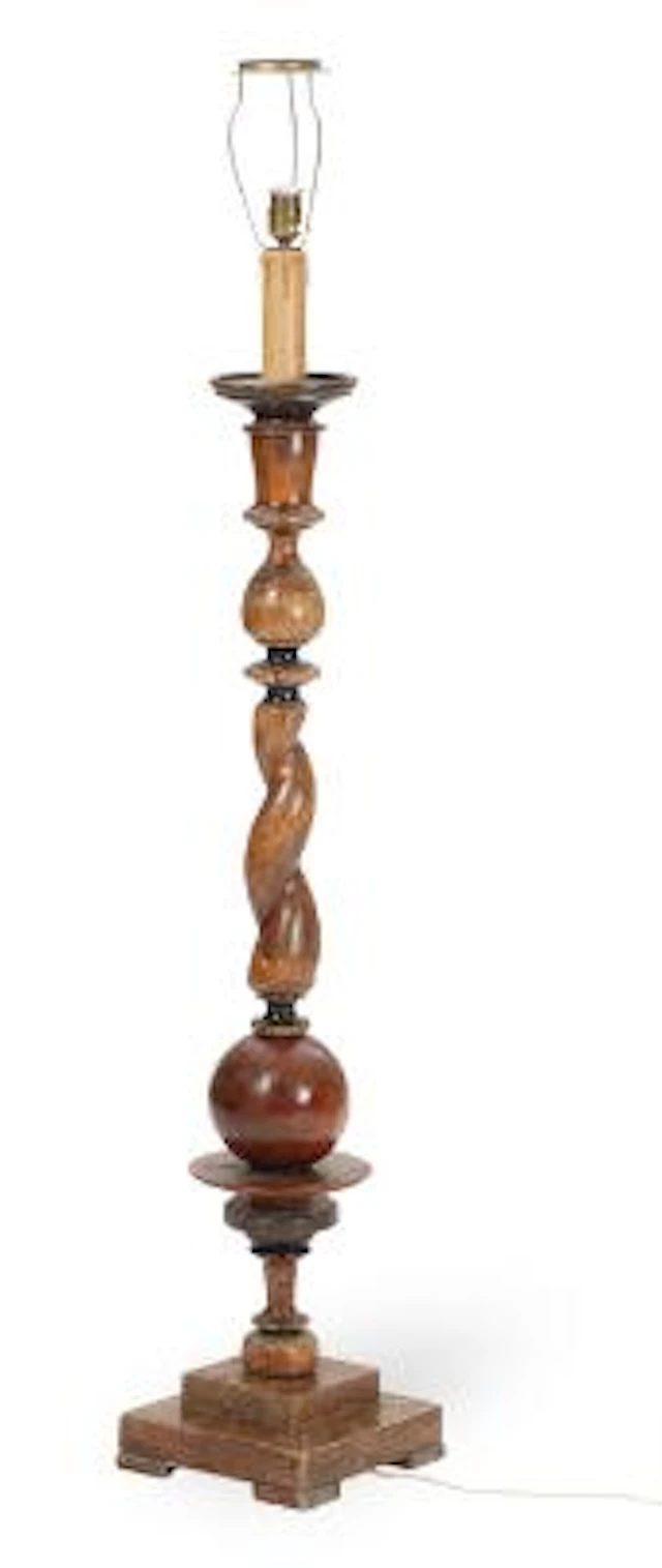 Floor lamp of carved and partly black-stained wood, twisted stem with