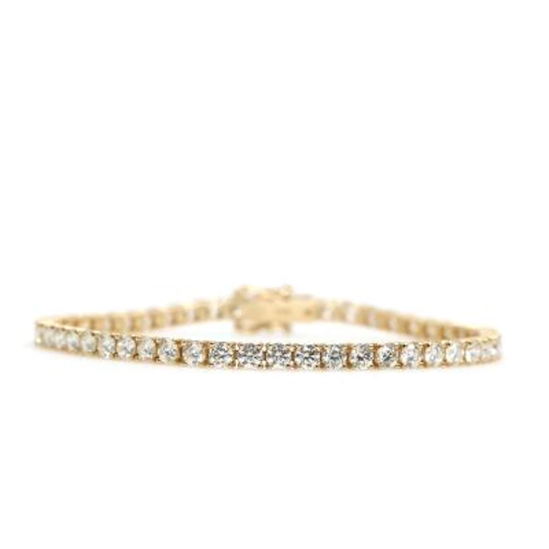 A diamond tennis bracelet set with 50 brilliant-cut diamonds weighing