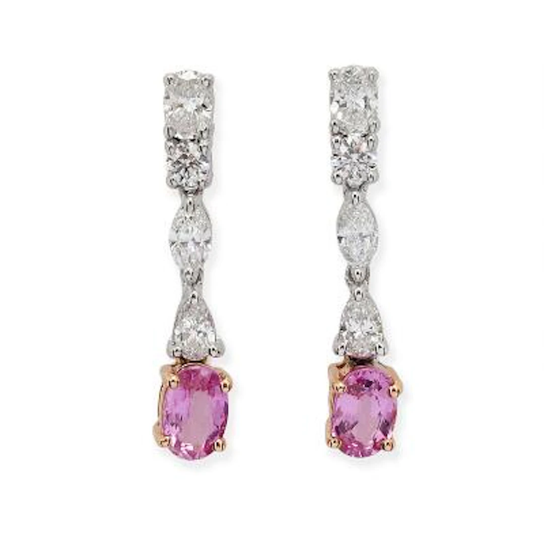 A pair of sapphire and diamond ear pendants each set with pink sapphire