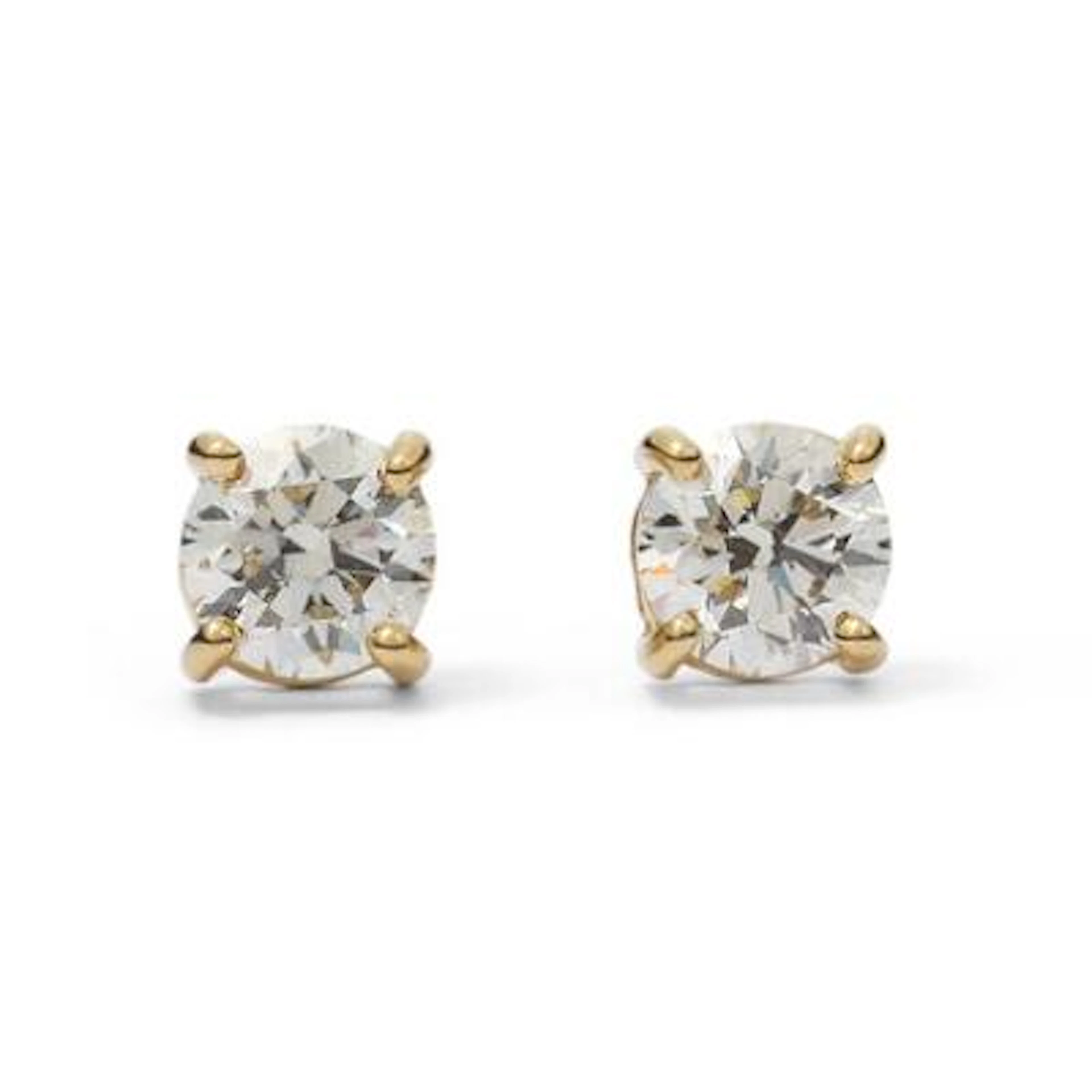 A pair of diamond ear studs each set with a diamond mounted in 18k