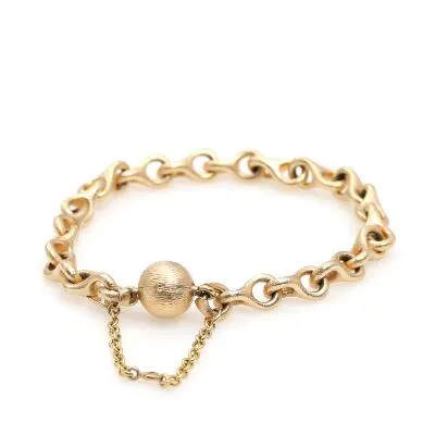 Ole Lynggaard: A bracelet of 14k satin gold accompanied by clasp of