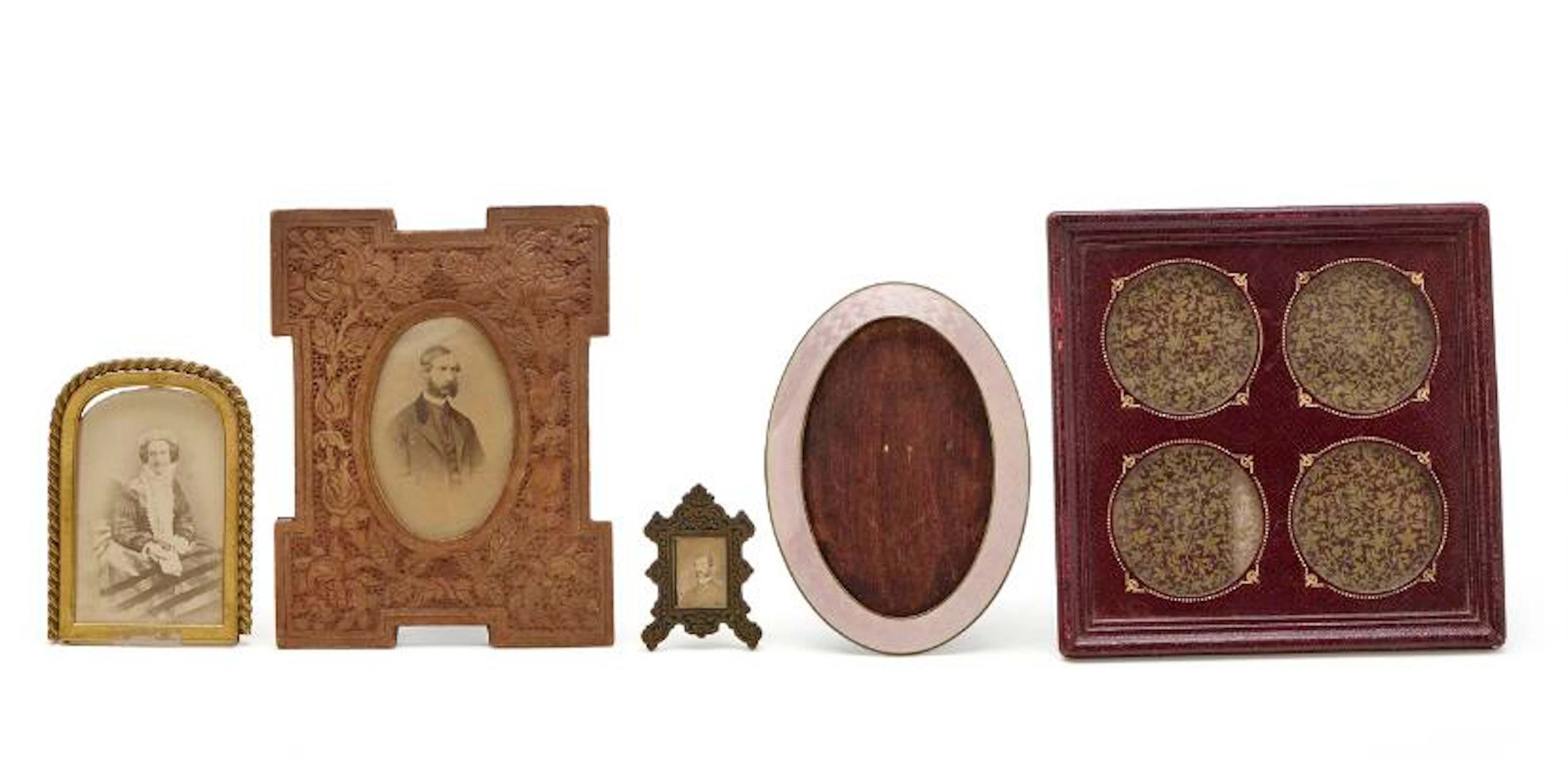 Five frames; silver/enamel, gilt-metal, wood, leather, metal. Some