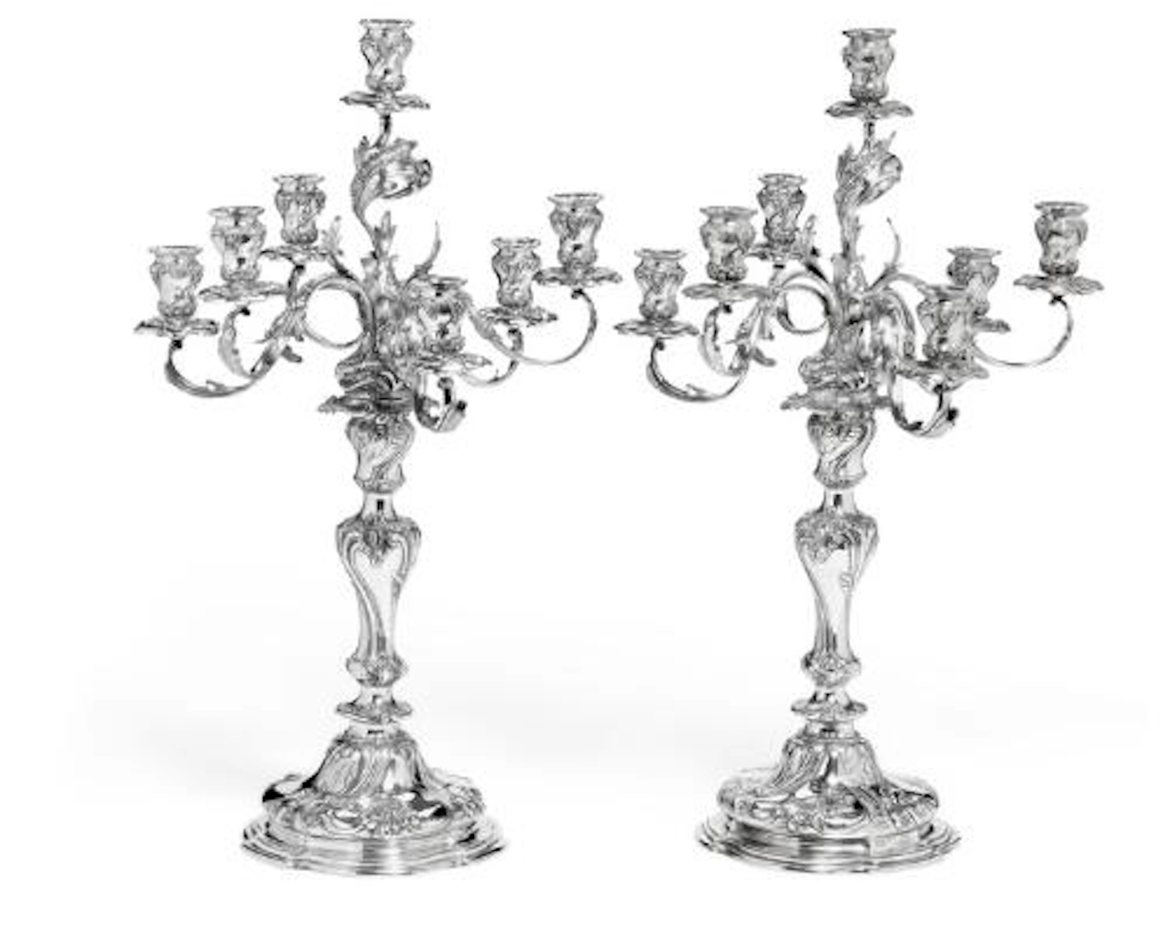 A pair of German Rococo Revival seven-light silver candelabra. Rudolf