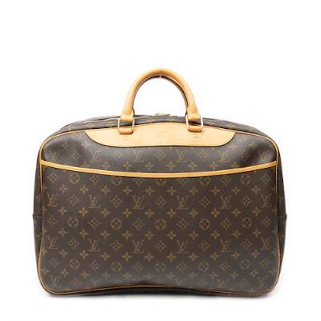 Louis Vuitton: An "Alize 24h" travel bag of brown monogram canvas