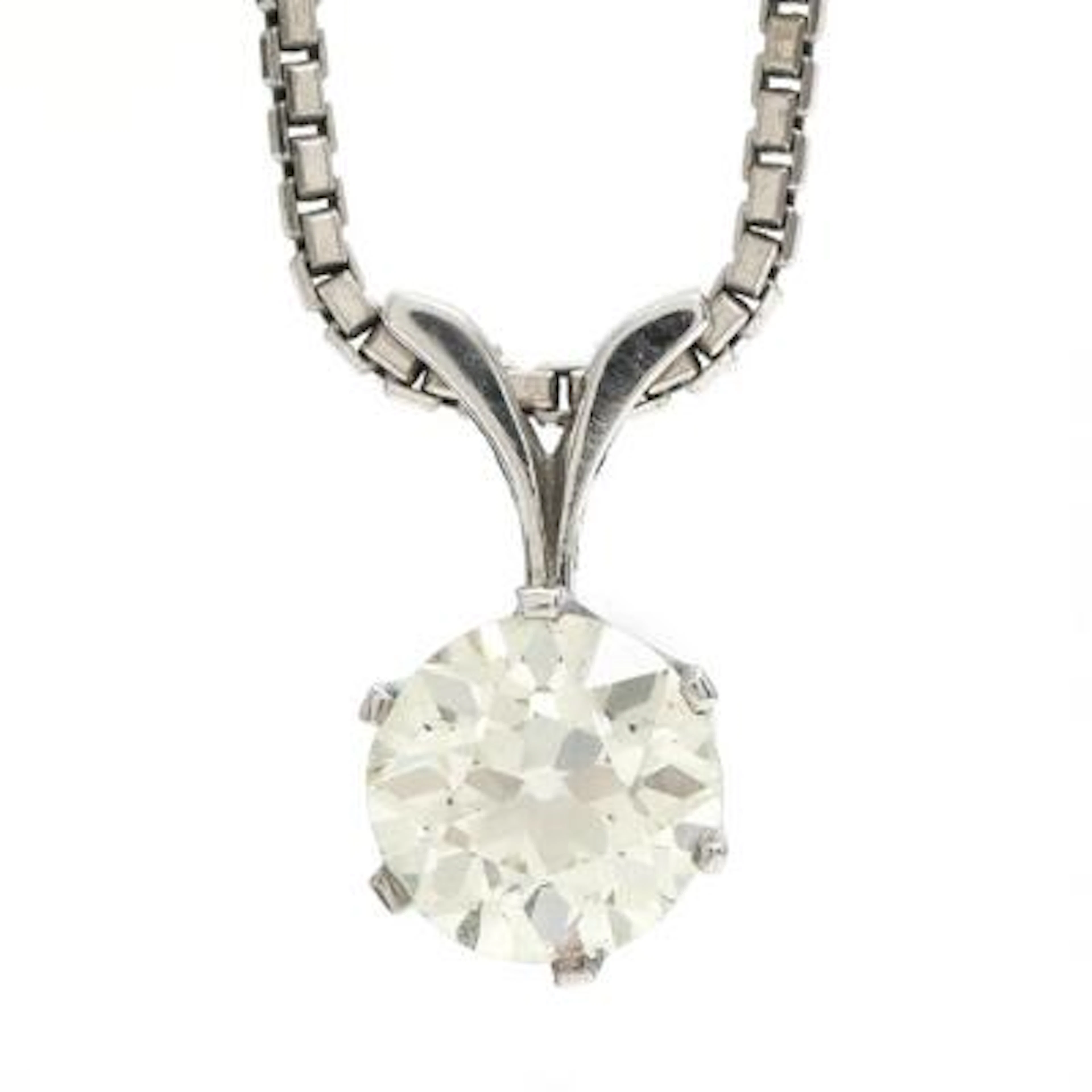A diamond pendant set with an old mine-cut diamond weighing app. 1.90