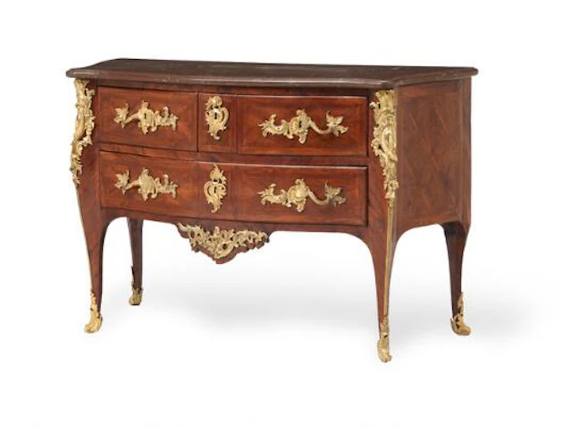French Louis XV commode in fruit wood inlaid with parquetry, gilded