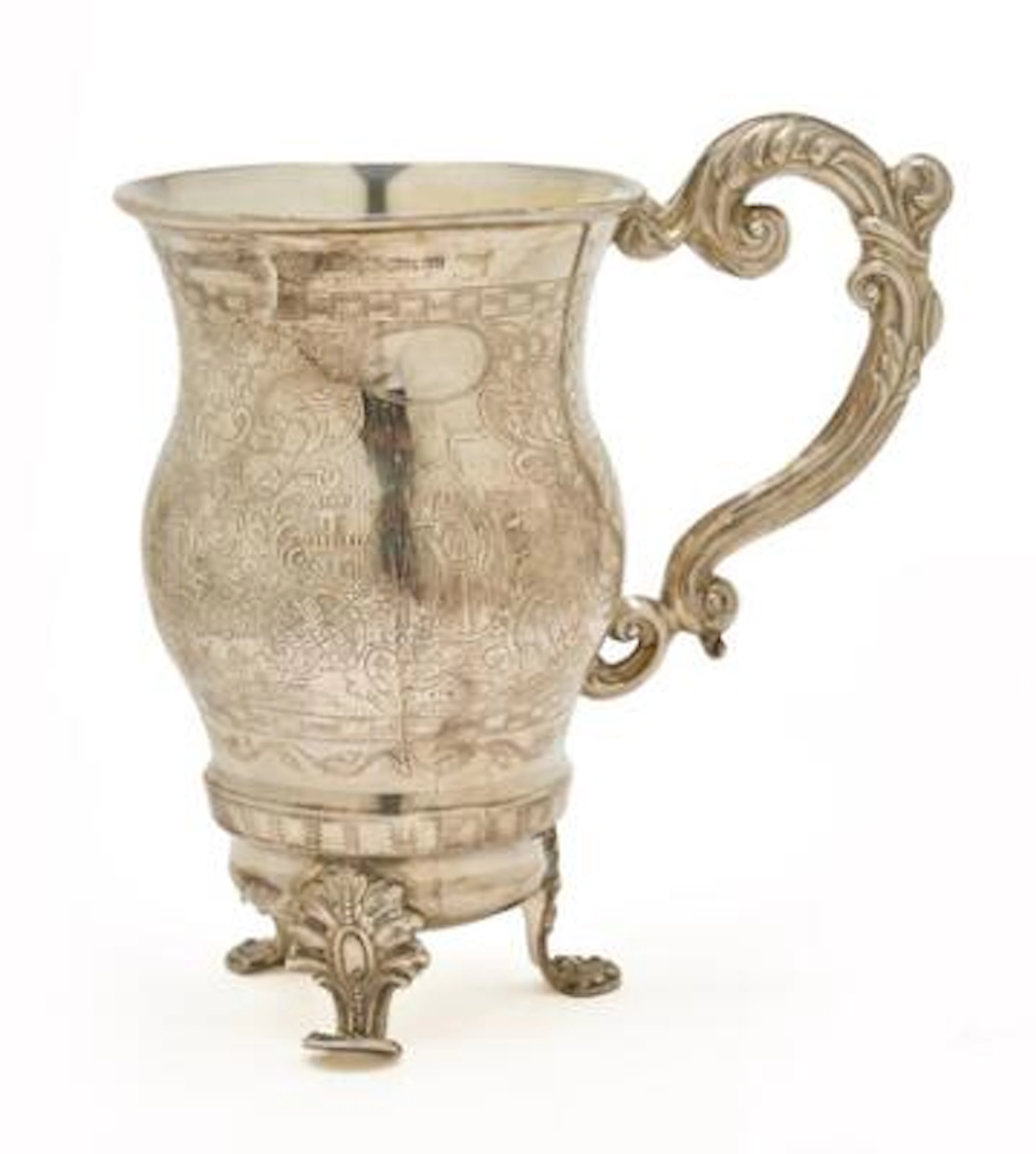 A Russian silver cup on three feet, gilt interior. Moscow, circa 1850.