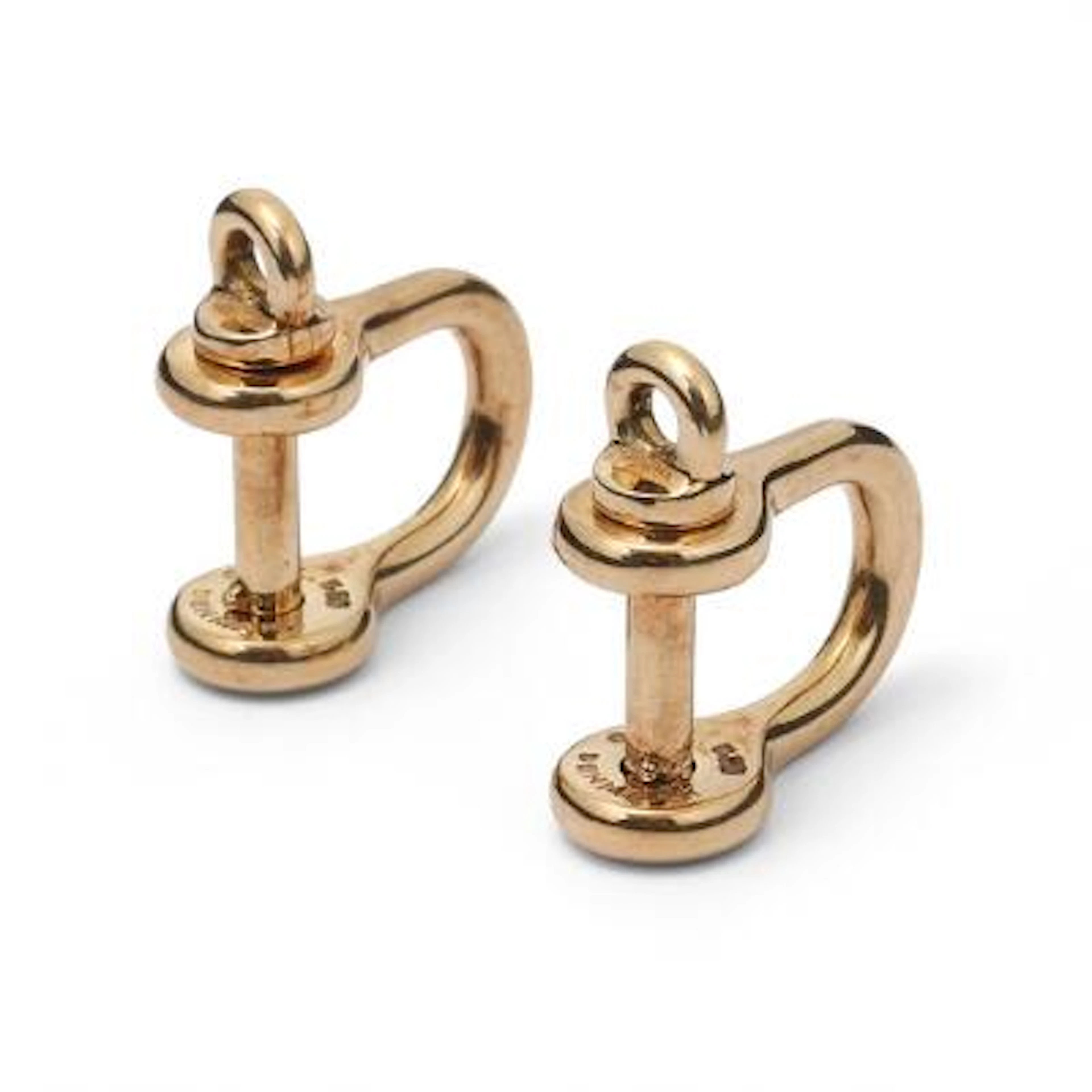 Ole Lynggaard: A pair of cufflinks of 14k gold in the shape of shackles.