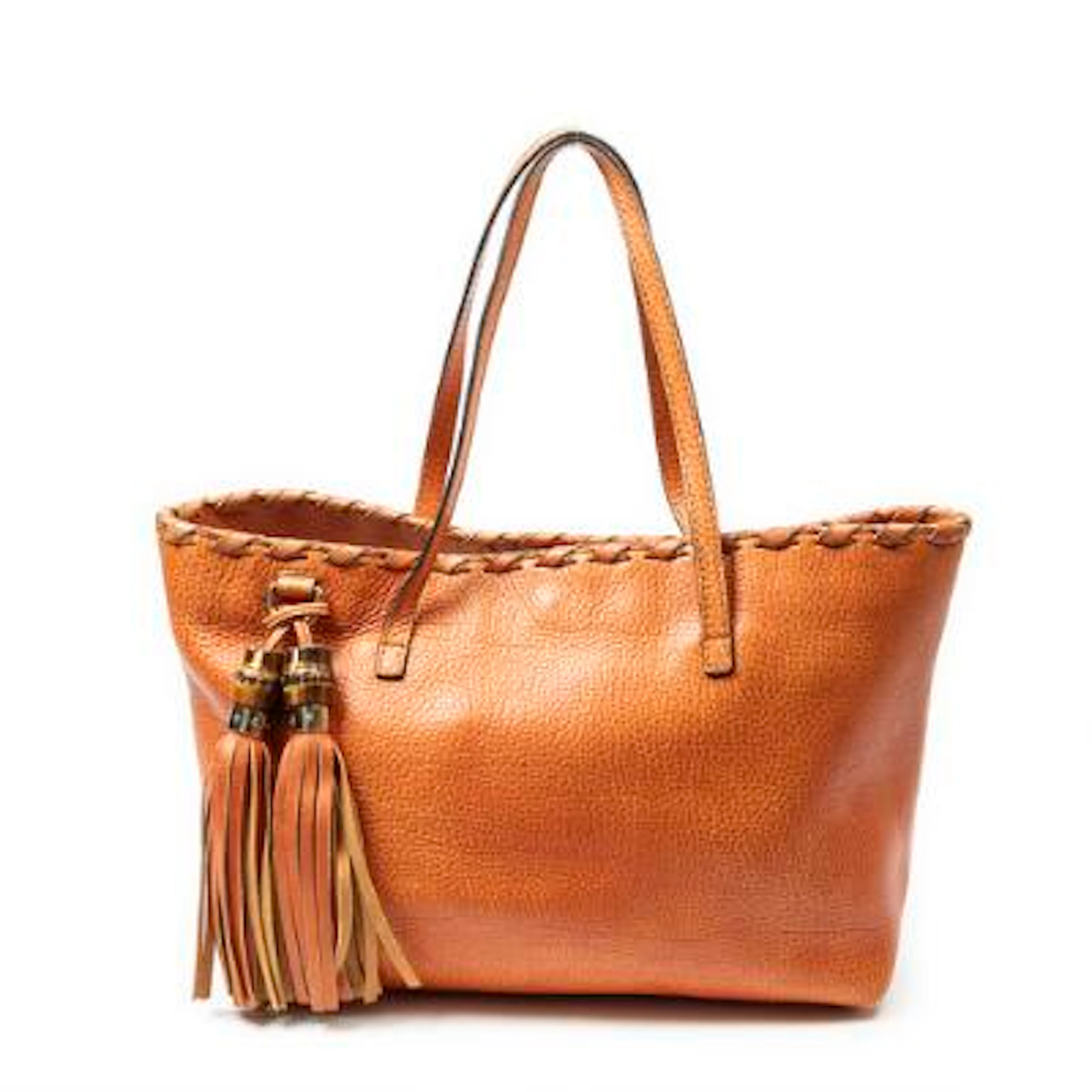 Gucci: A "Bamboo Tassel Shopping Tote" in orange leather with gold-tone