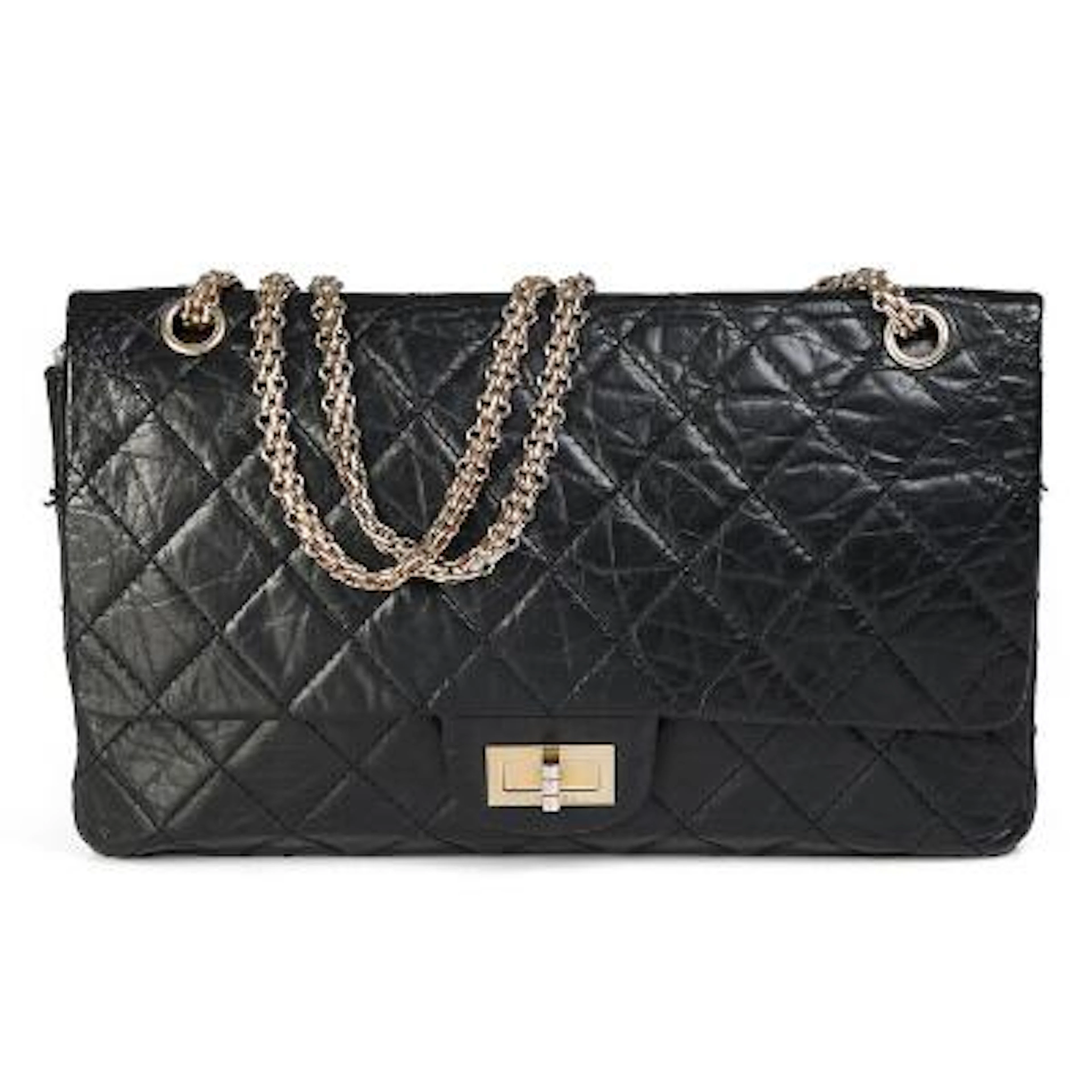 Chanel: A "Reissue" bag of black quilted leather with gold tone hardware