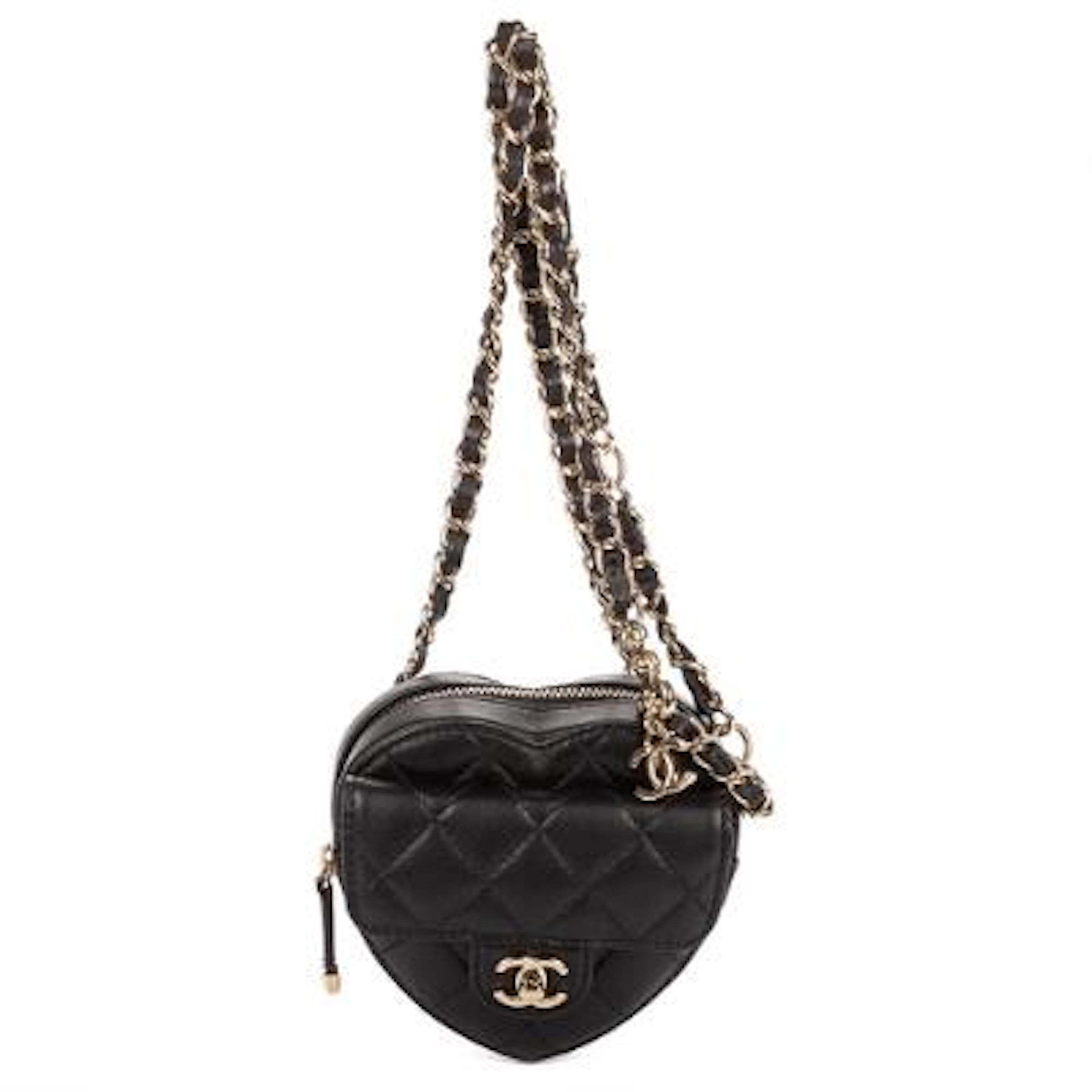 Chanel: A "Heart Belt Bag" in black quilted leather with gold-tone