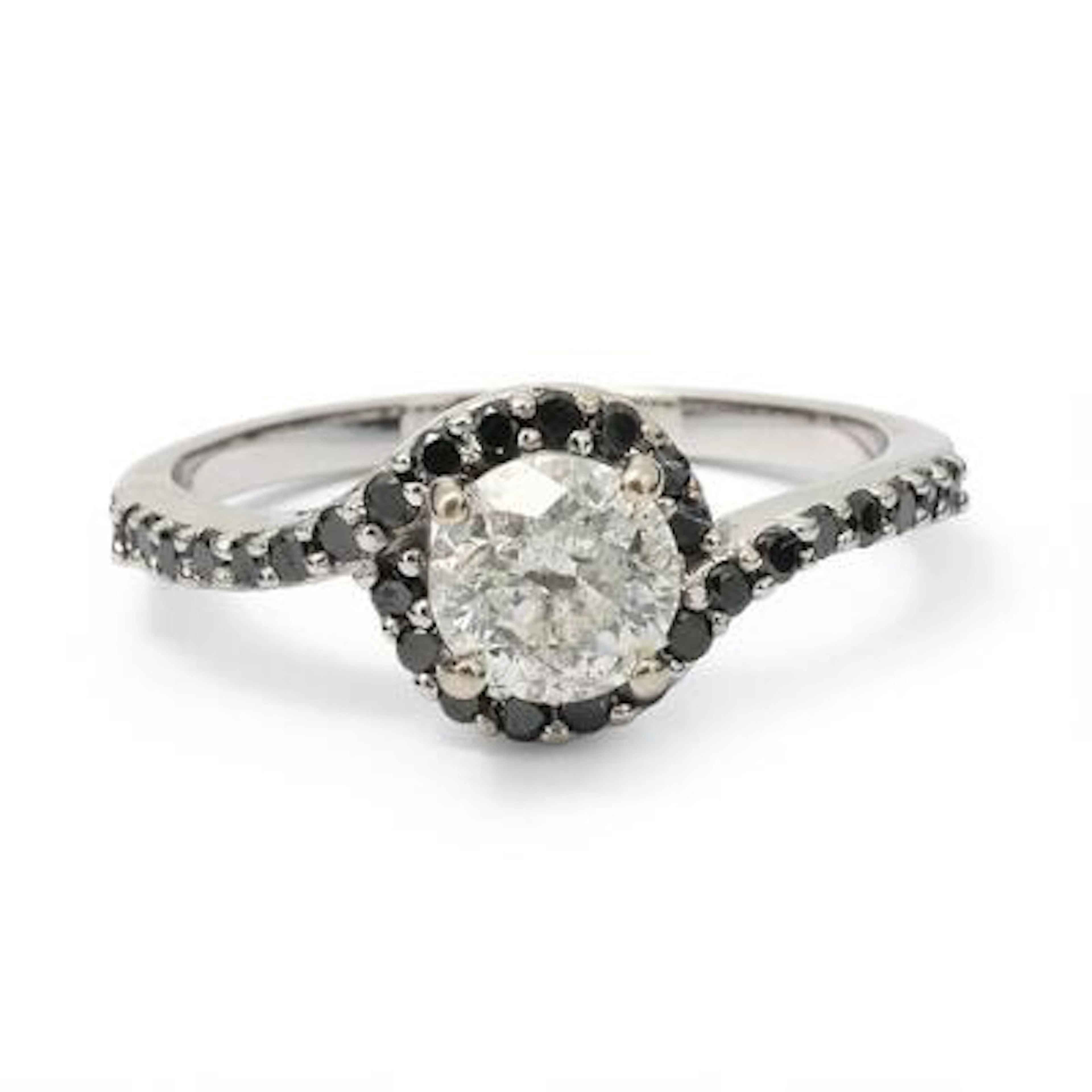 A diamond ring set with numerous brilliant-cut diamonds mounted in
