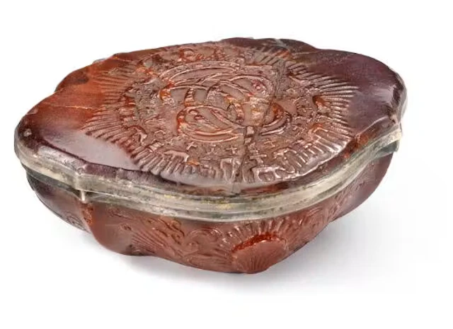 Danish workshop, 18th century: A Royal presentation amber and silver-gilt