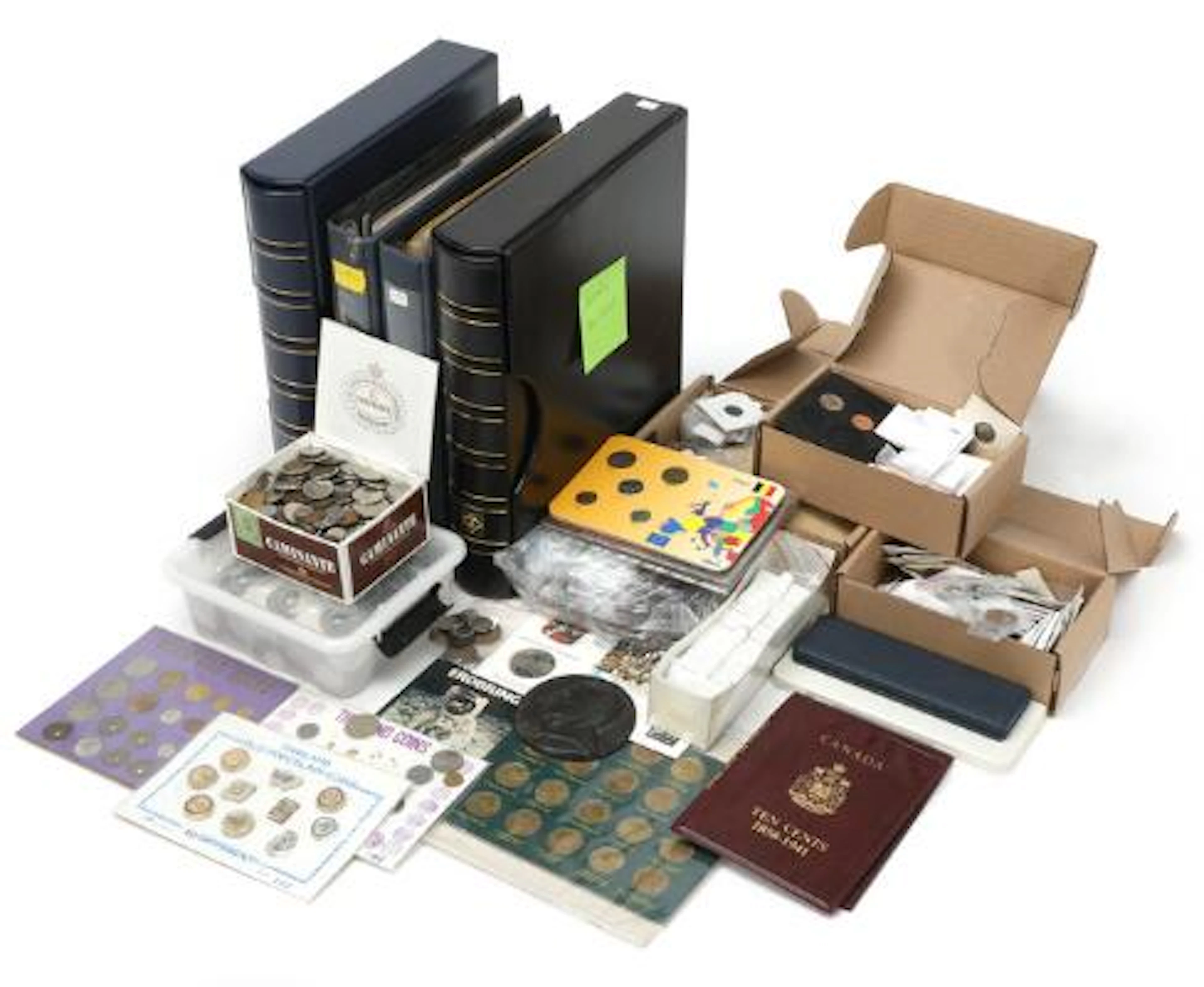 4 albums with coins from Australia, Belgium, Holland, New Zealand