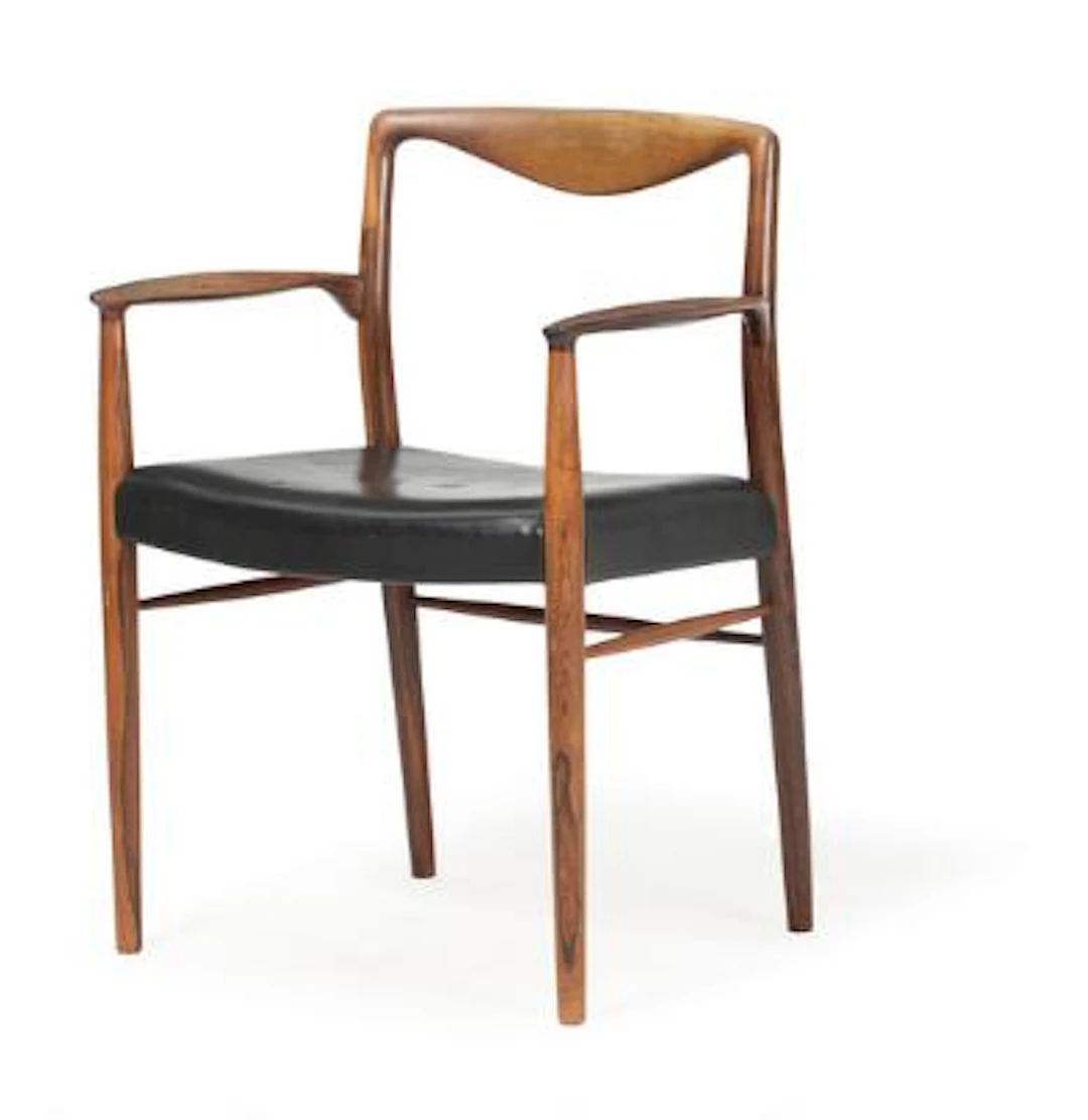 Kai Lyngfeldt Larsen: A rosewood armchair, upholstered with black