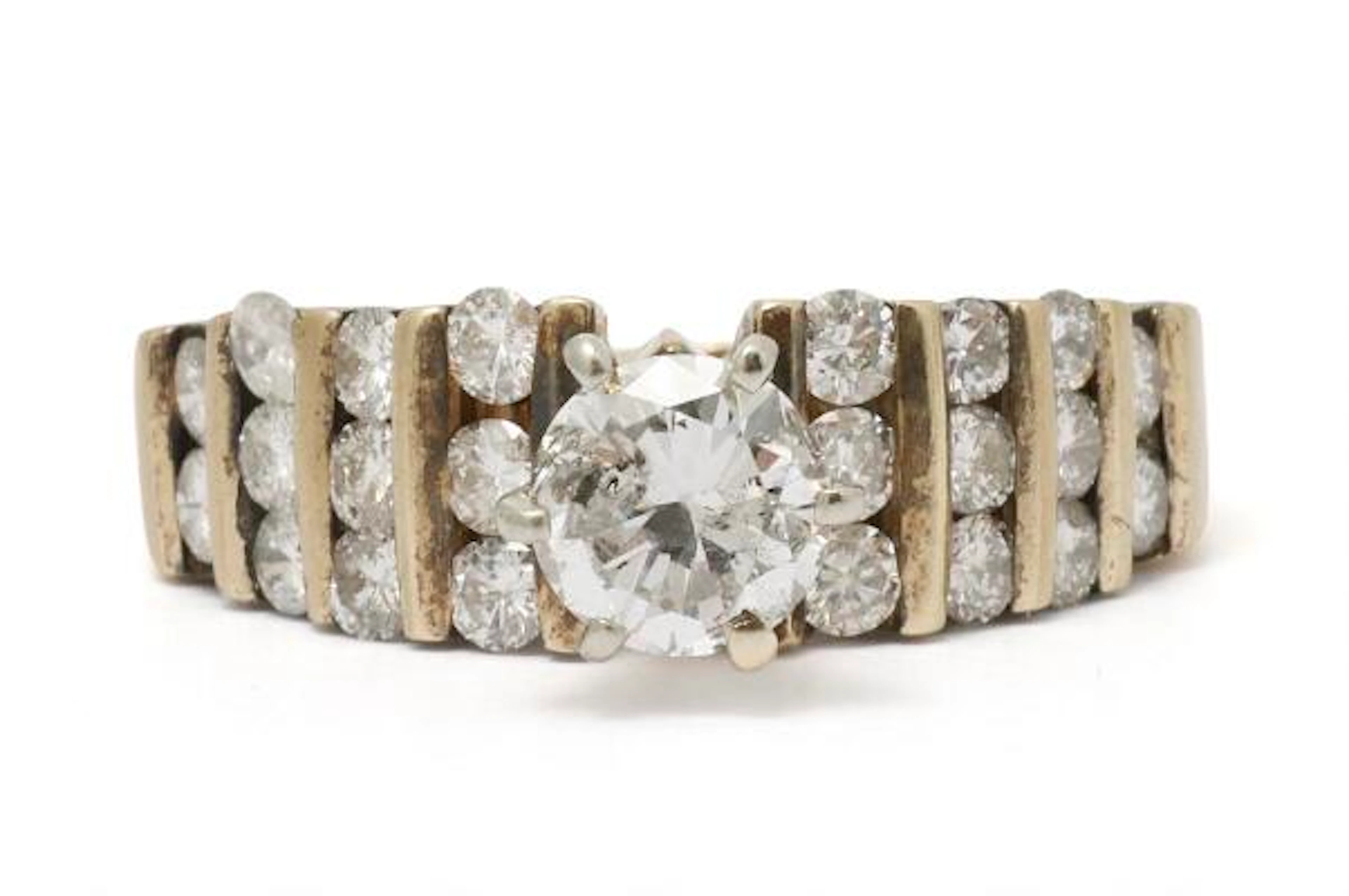 A diamond ring set with numerous brilliant-cut diamonds, mounted in