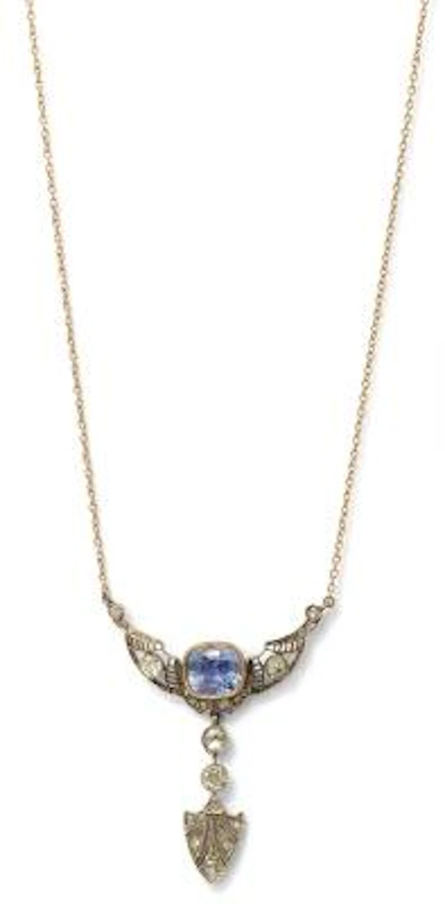 A sapphire necklace set with a sapphire and diamonds, mounted in 18k