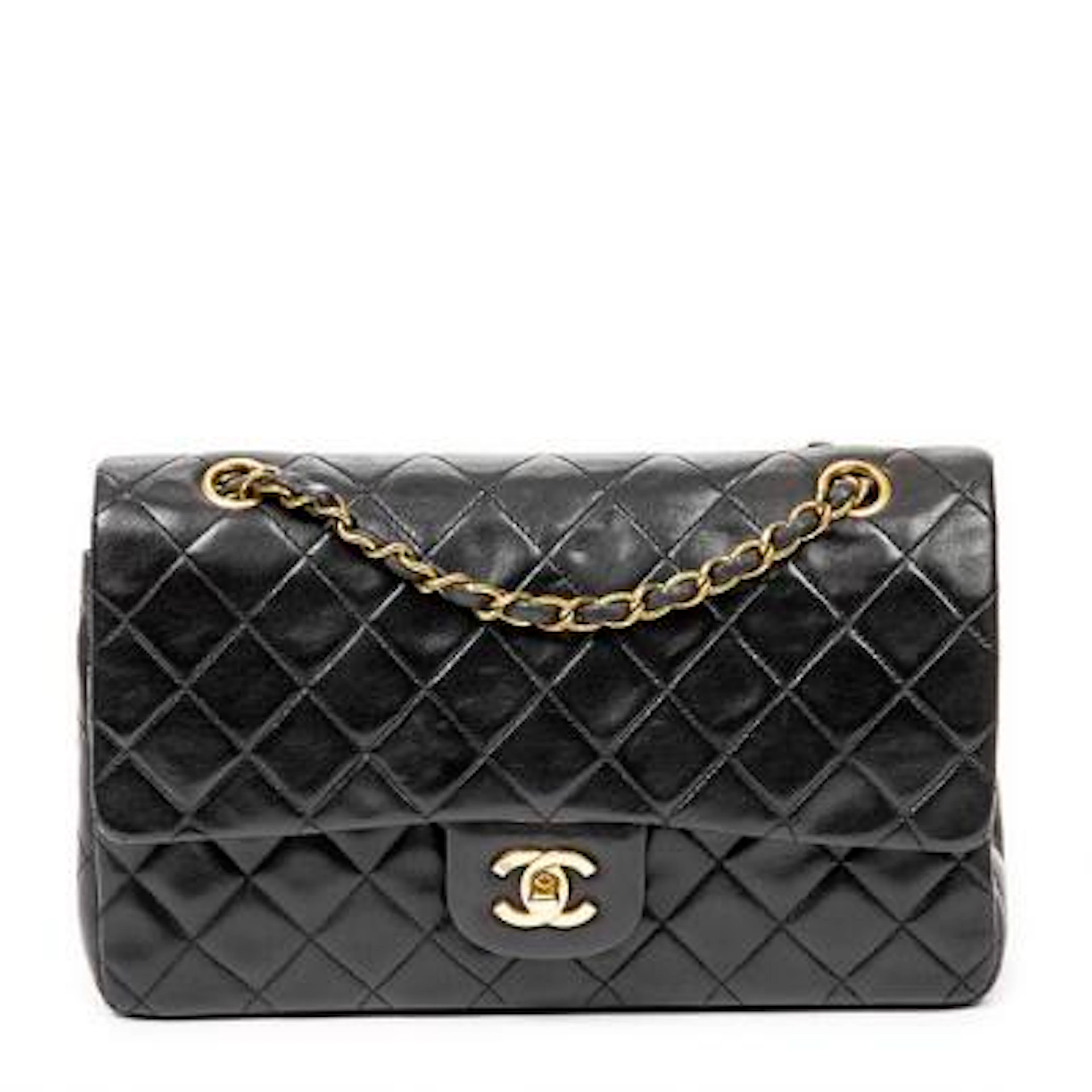Chanel: A "Classic Double Flap" handbag in black quilted leather with