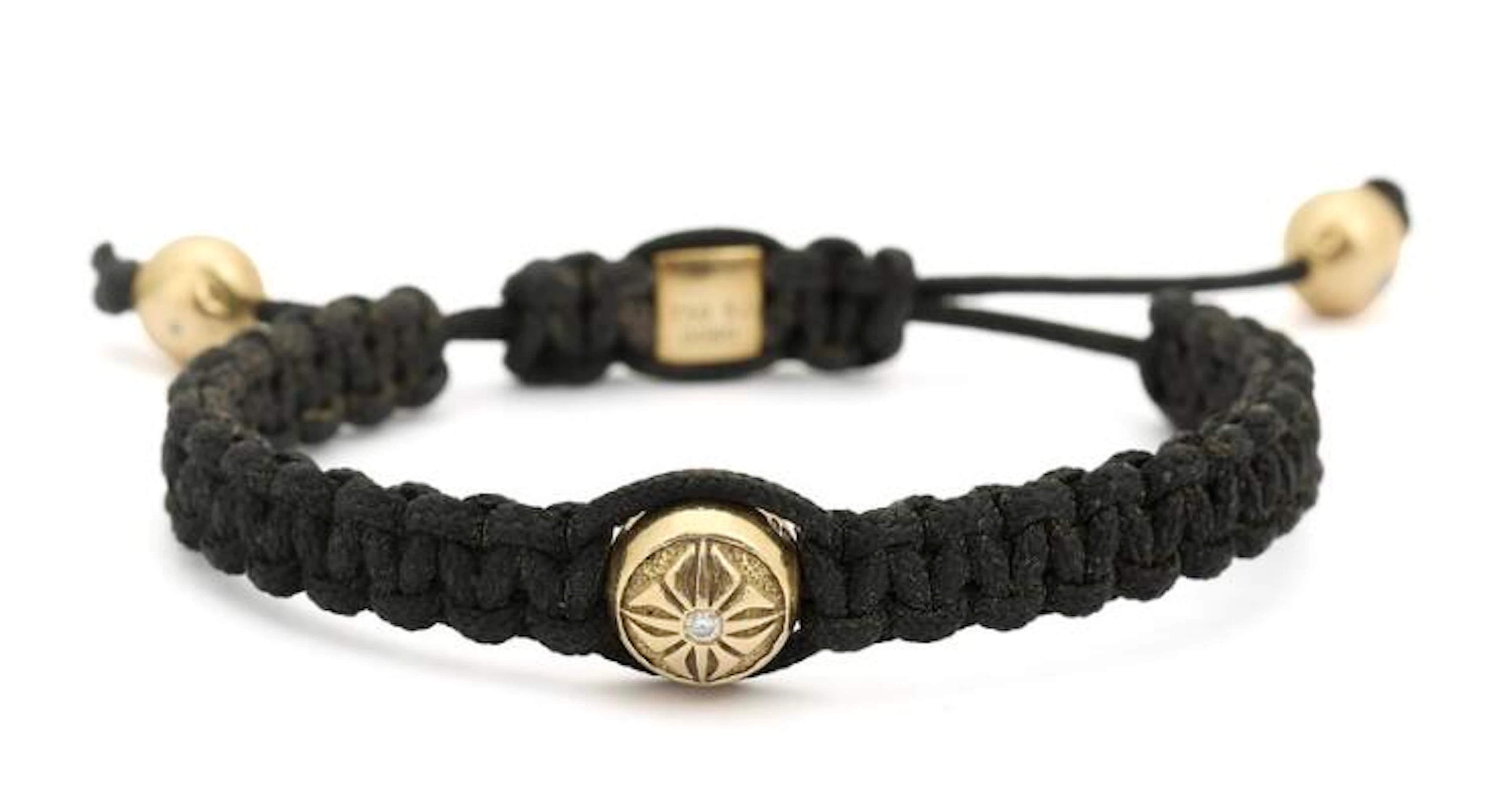 Shamballa: A bracelet with diamond beads, clasp and end pieces of