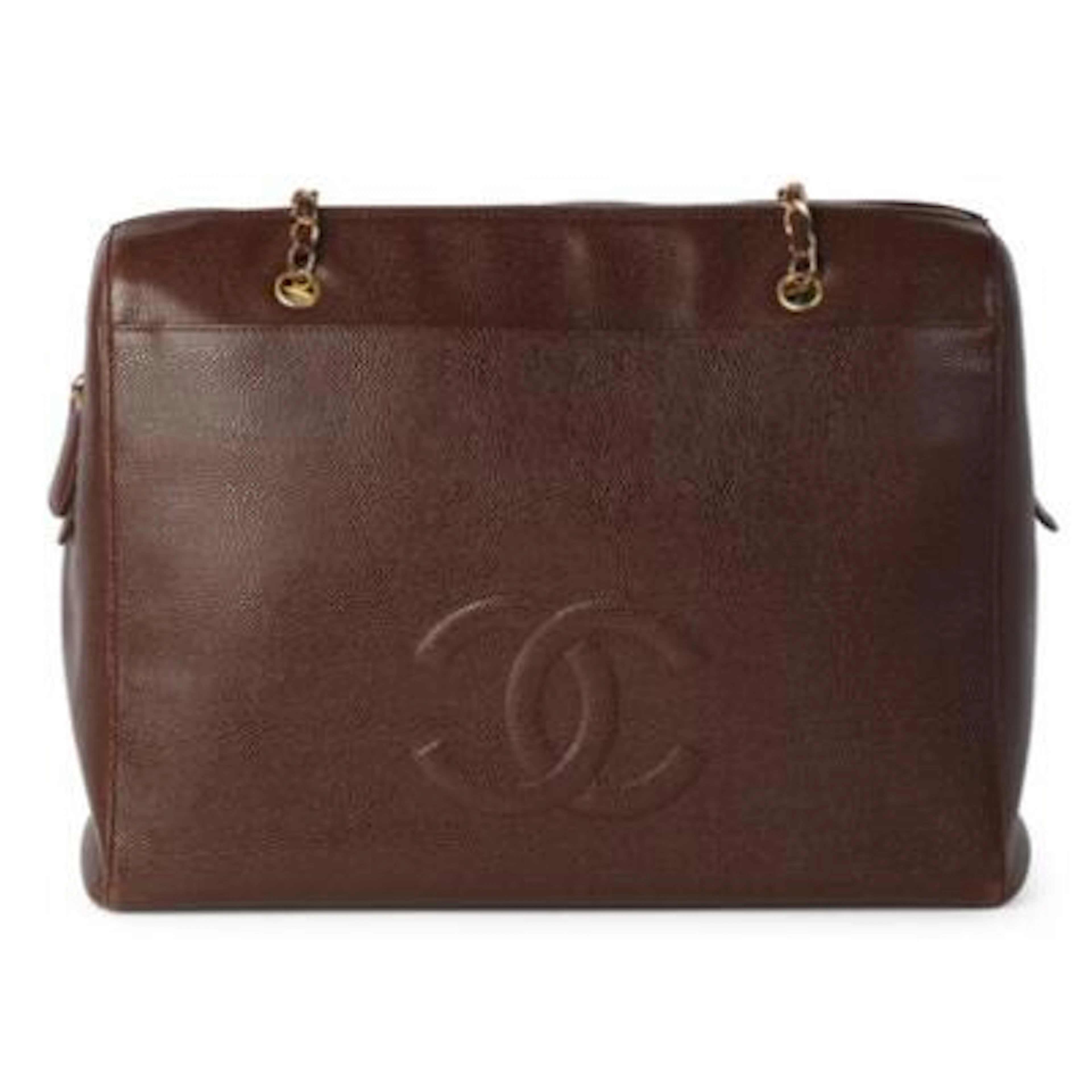 Chanel: A vintage tote bag of dark brown caviar leather with gold