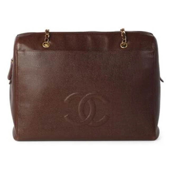 Chanel: A vintage tote bag of dark brown caviar leather with gold