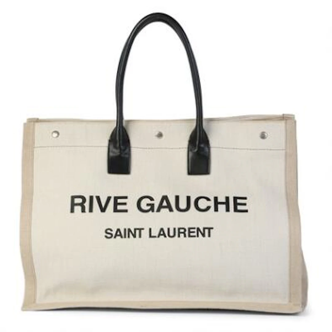 Saint Laurent: A "Rive Gauche" tote bag of beige canvas with black