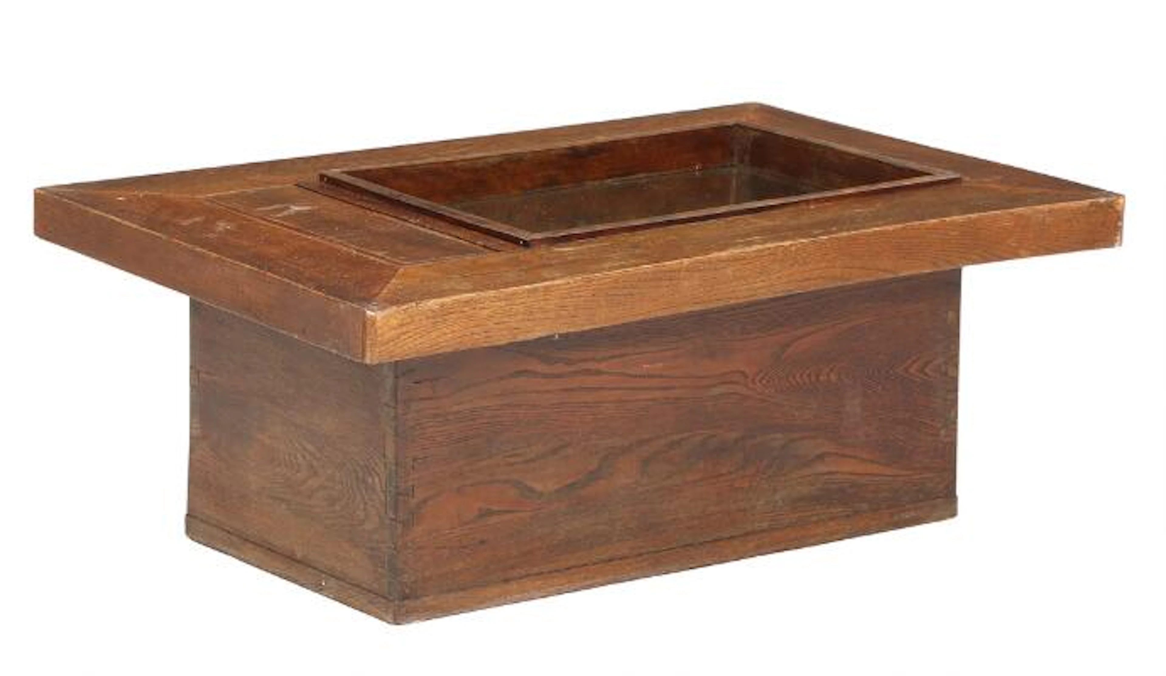 Hibachi, Japanese traditional table grill of stained wood and copper.