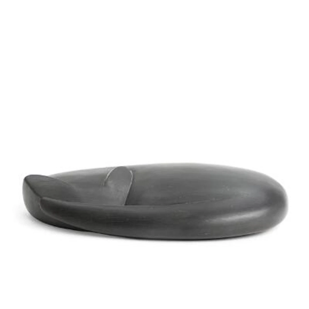 Jacob Hermann: Cat. Signed monogram. A carved ebony figure. L. 17