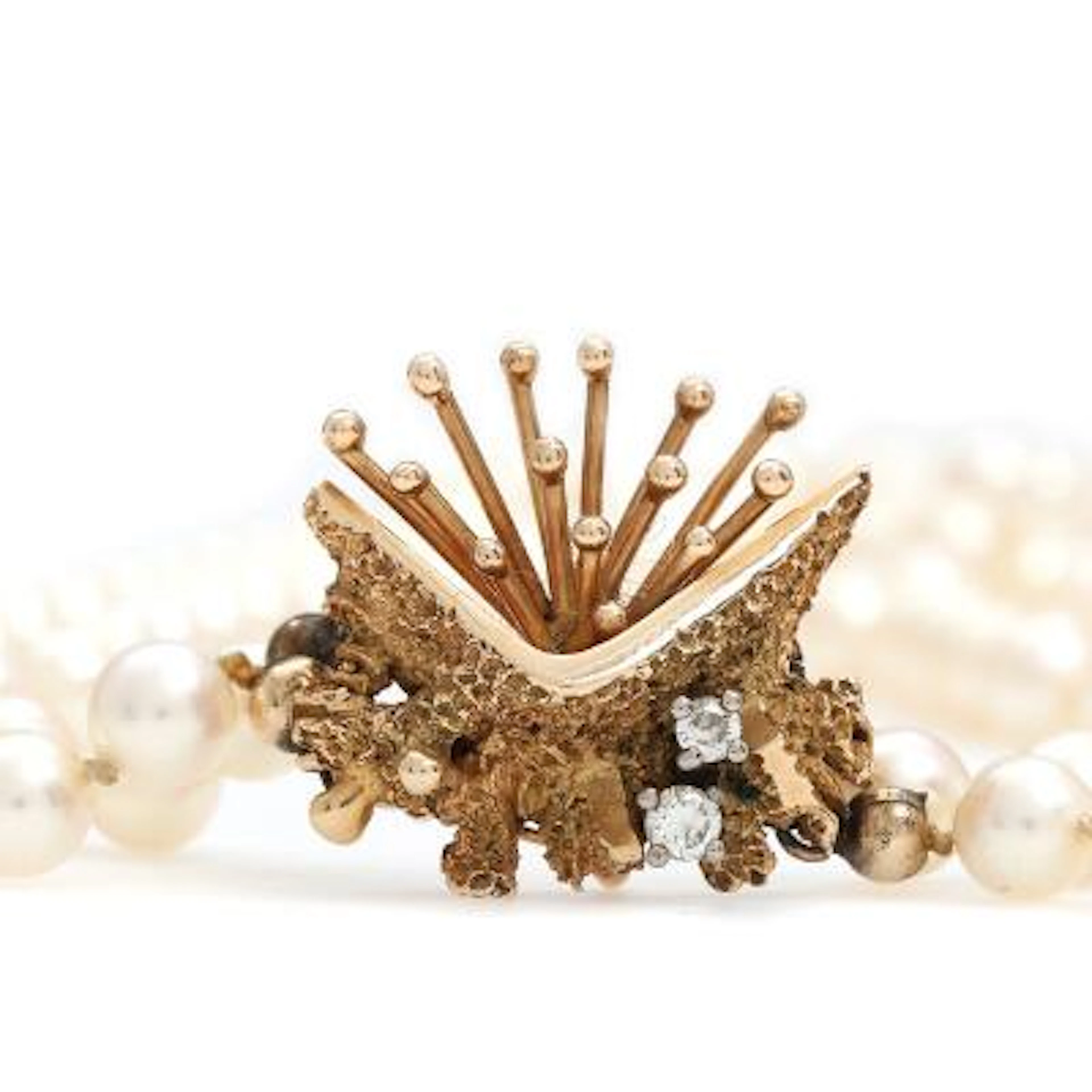 Per Borup: Diamond clasp set with two diamonds, mounted in 14k gold